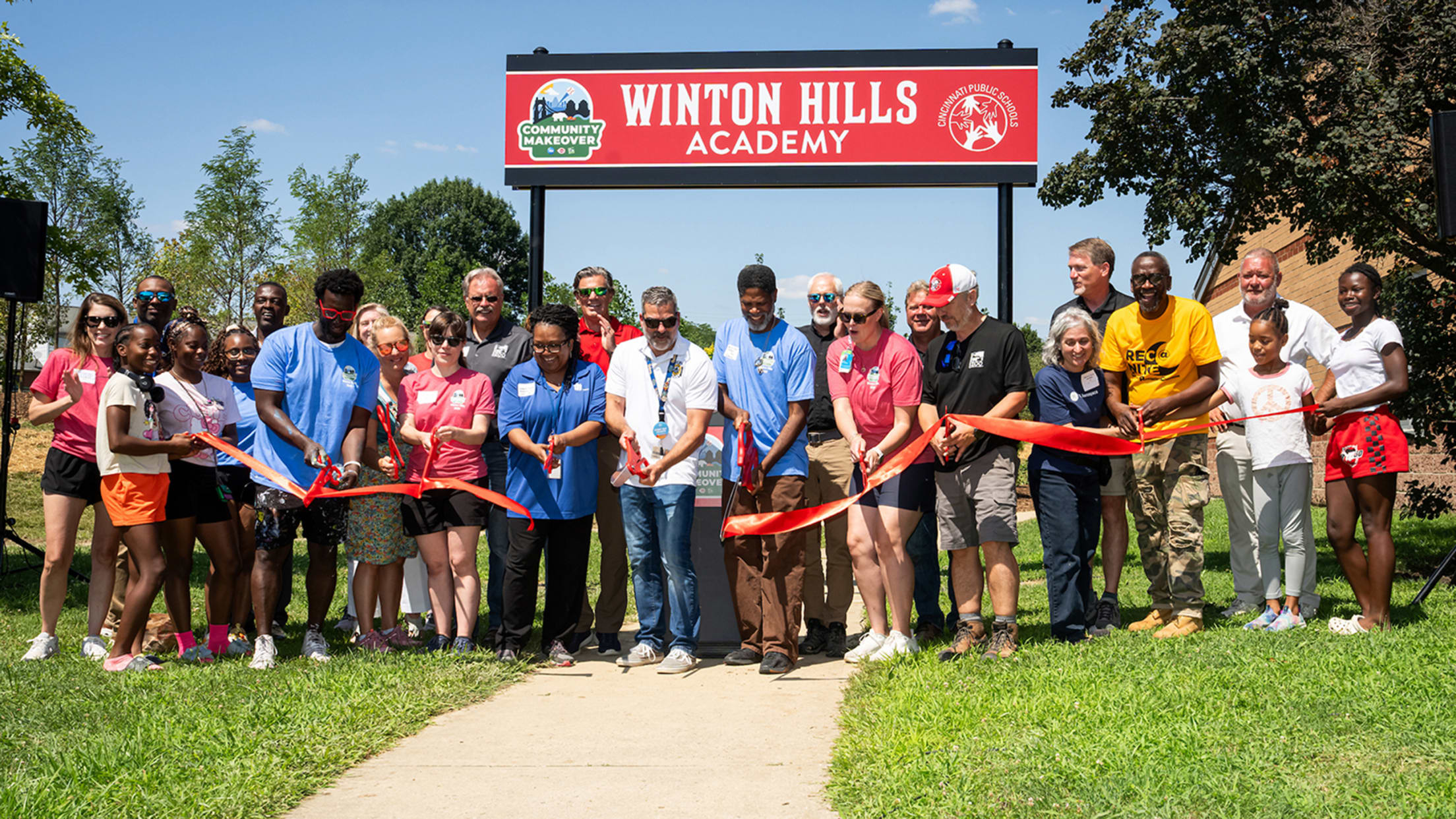 Cutting the ribbon at Winton Hills Academy.