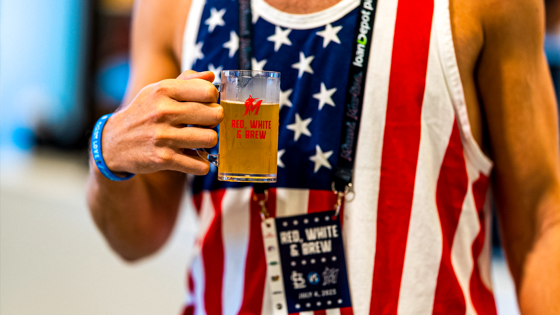 Fan enjoying the Red, White & Brew event at a Marlins game