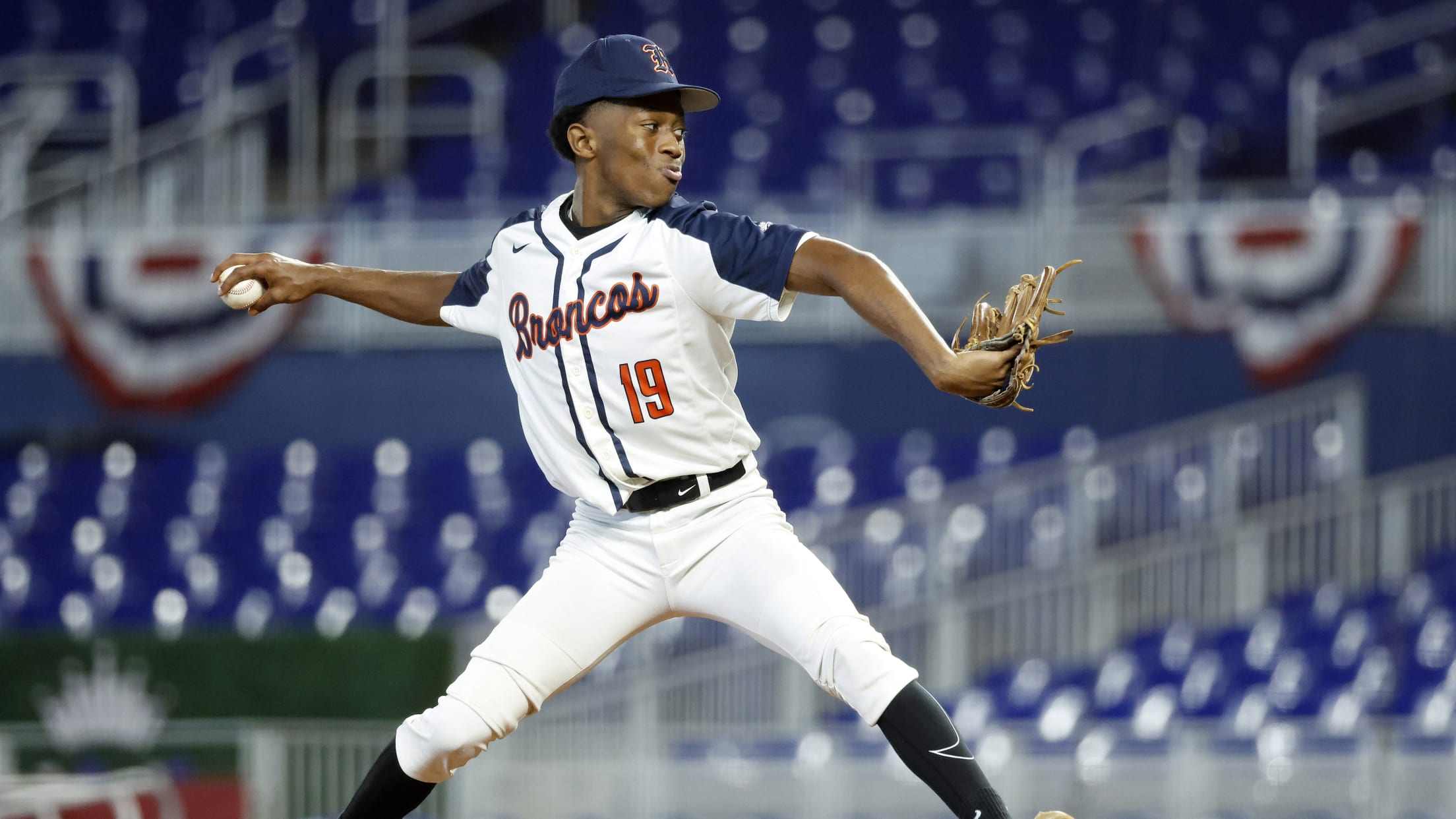 A player pitches at the Jackie Robinson Classic.