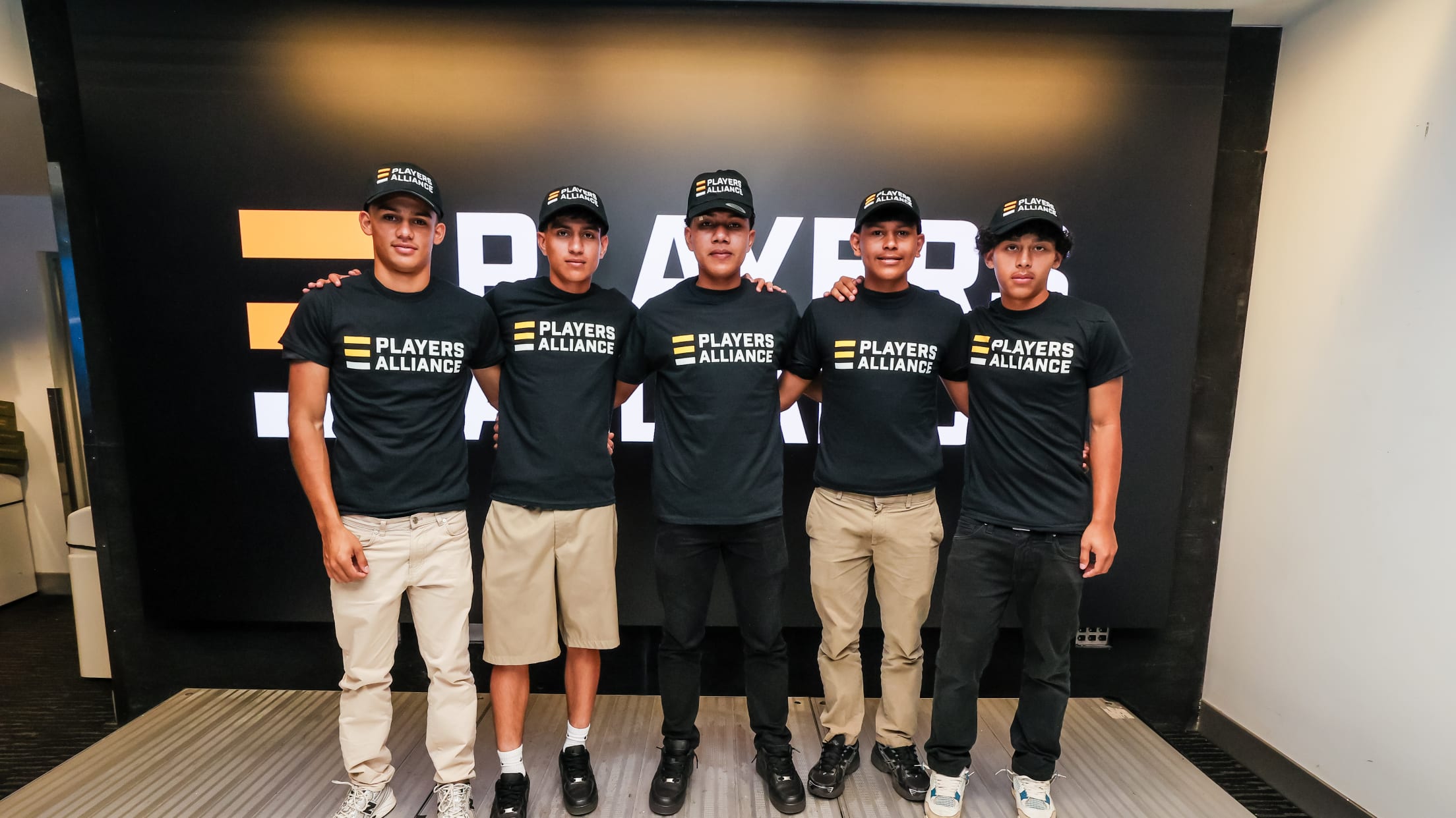 Players pose for a group photo at The Players Alliance Equip the Future Clinic.