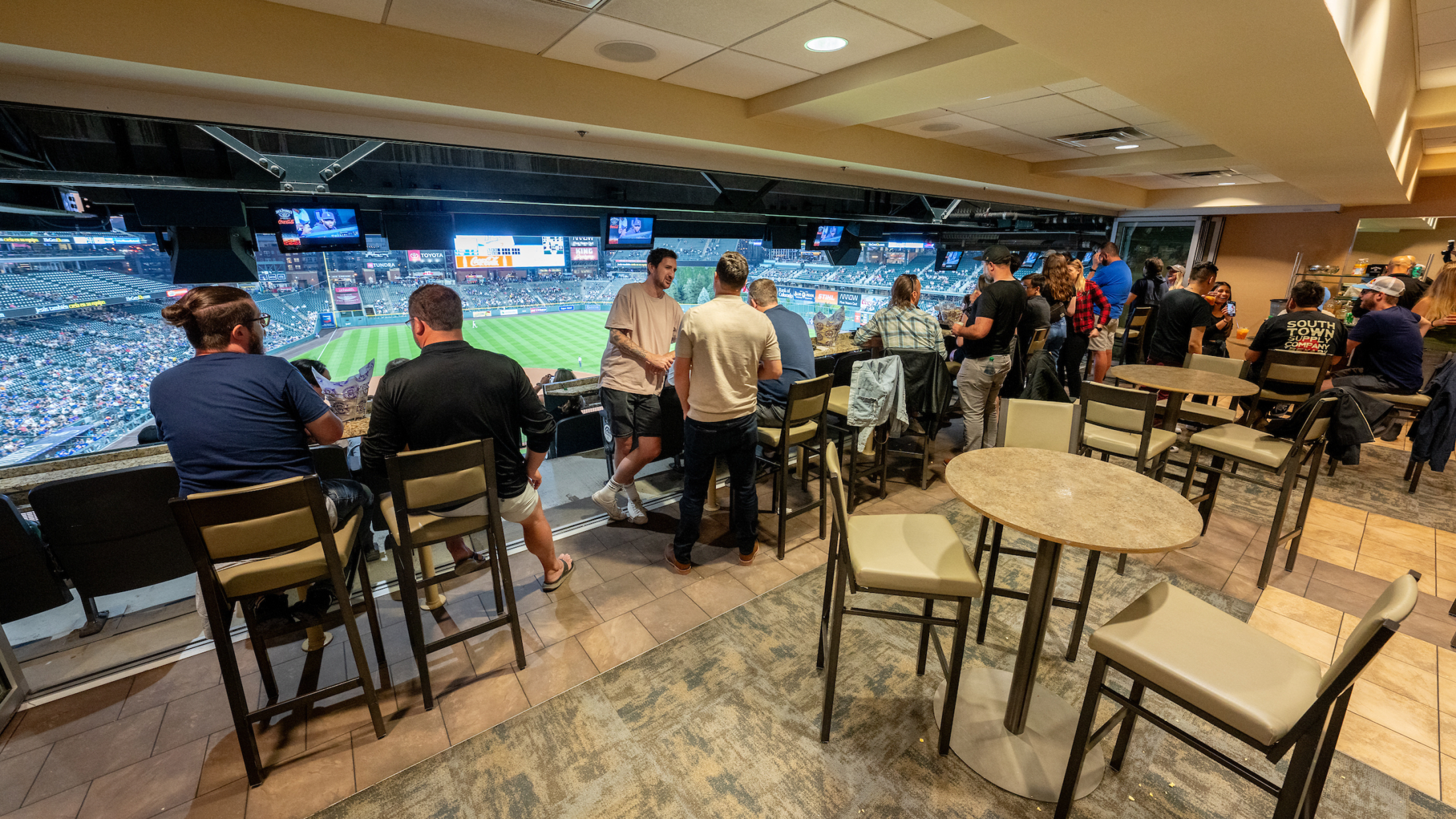 Premium infield suite at Coors Field offering Colorado Rockies luxury seating and panoramic field views.