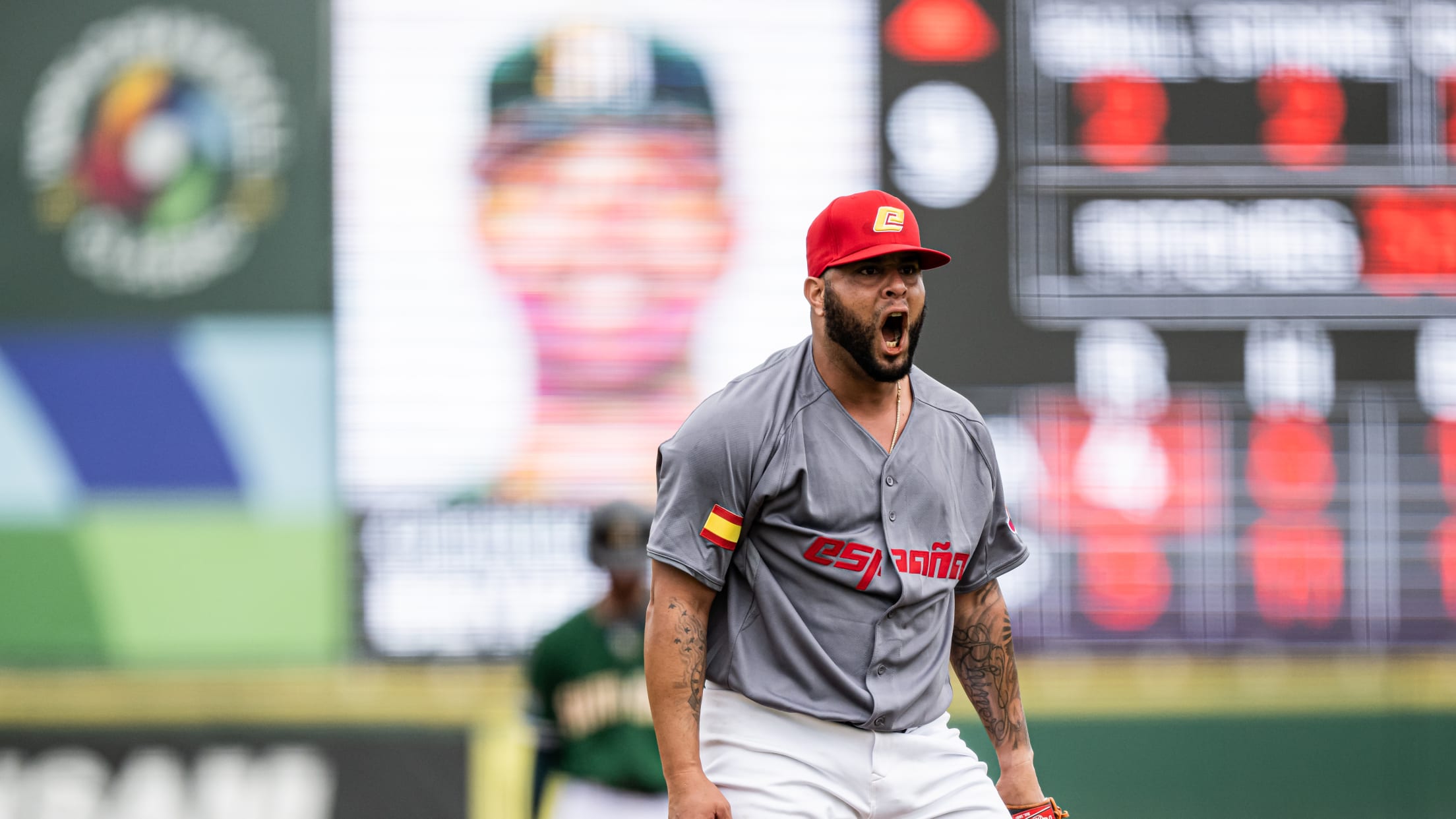 Spain pitcher Rhiner Cruz celebrates after getting an out against South Africa in the 2022 World Baseball Classic Qualifiers in Regensburg.