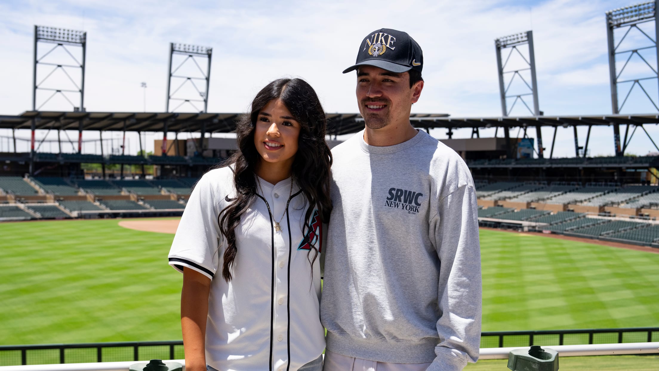 Corbin Carroll takes a picture with a player from Nike RBI.