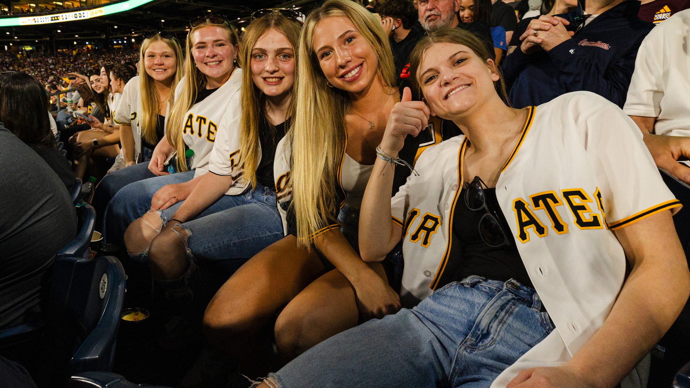 Group of Pirates fans enjoying the game