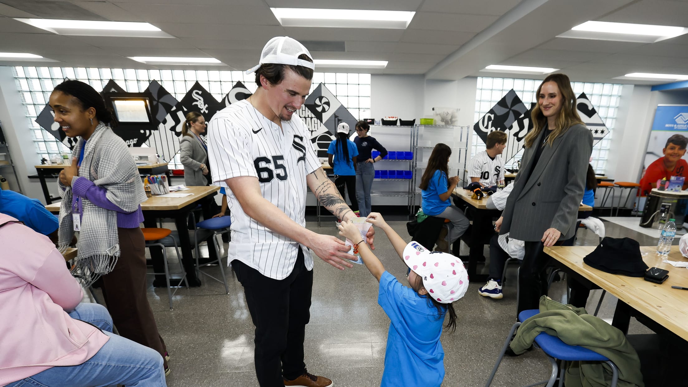 Davis Martin interacts with young fans at a Boys & Girls Club event in Chicago.