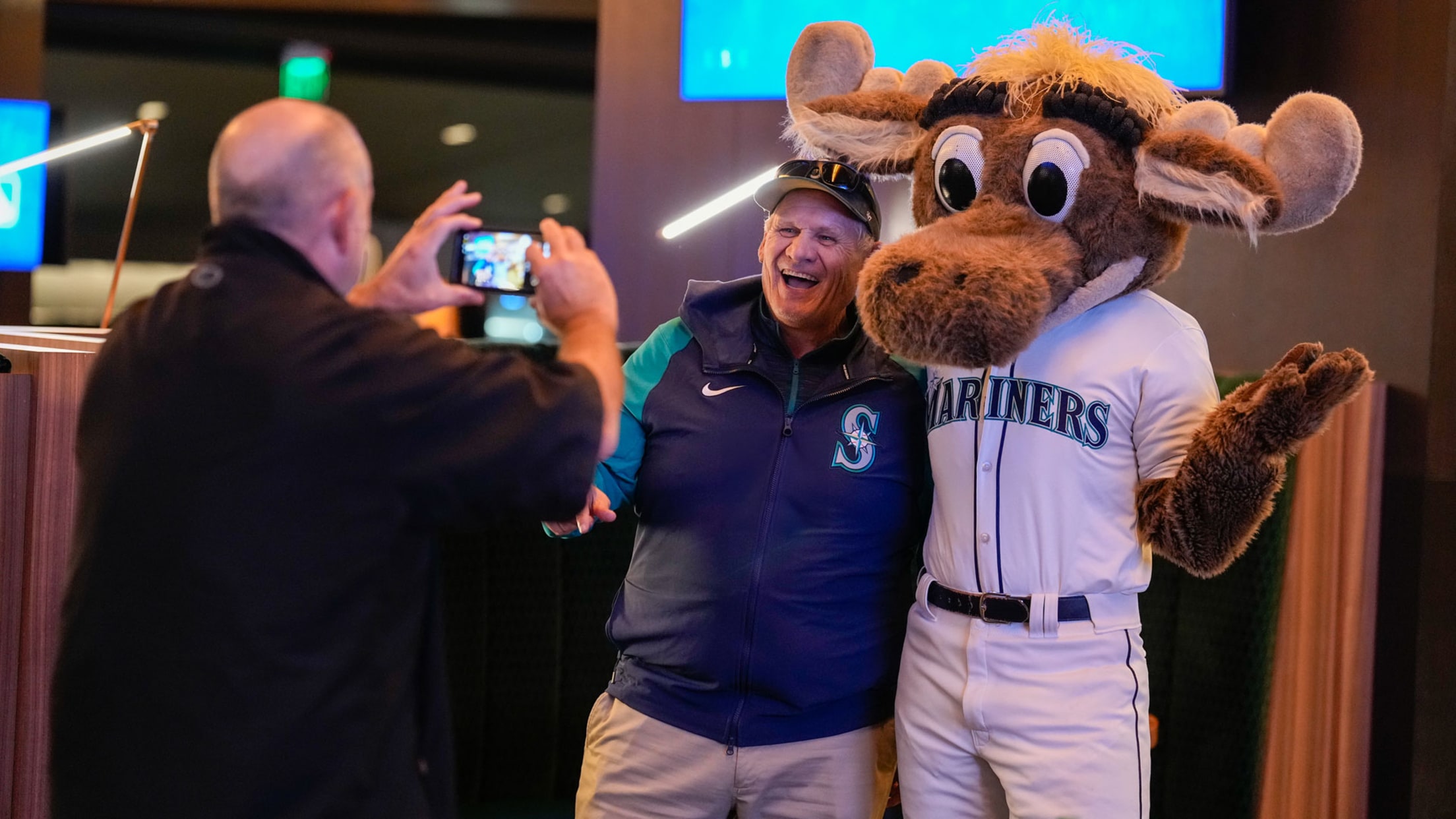 Image of fan posing with Moose