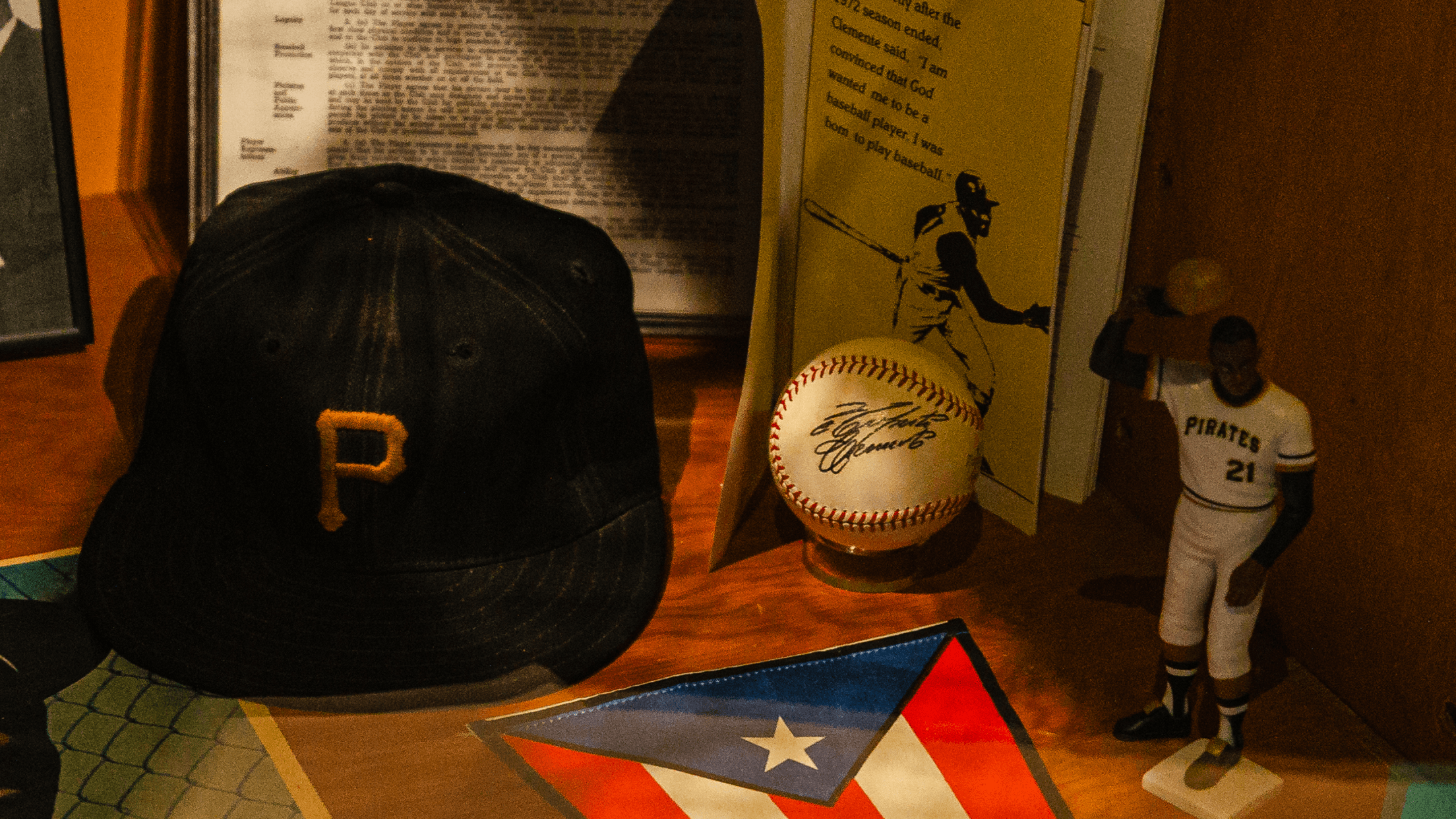 Game worn Roberto Clemente Pirates cap and other items