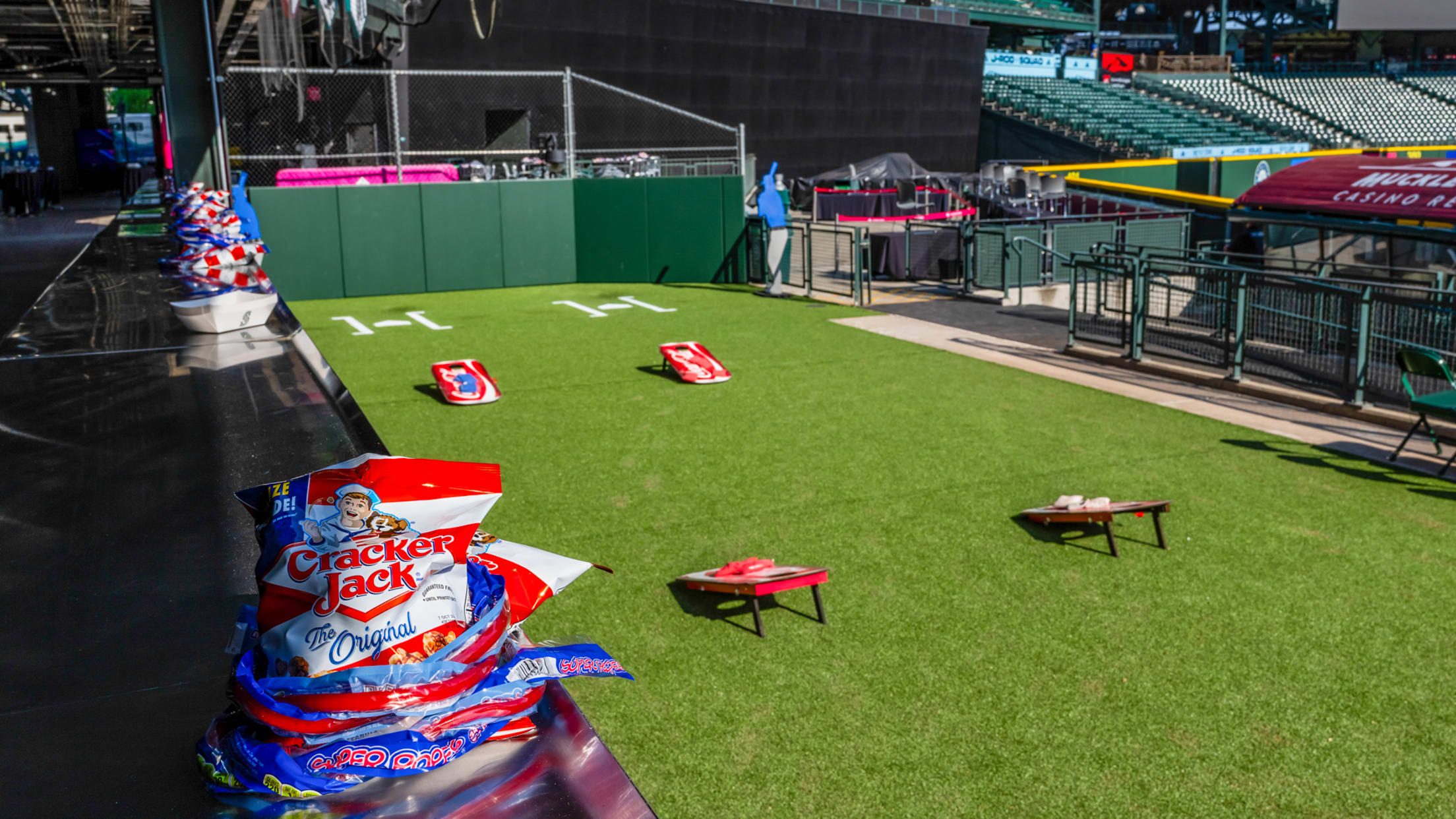 Image of bullpen at T-Mobile Park with cornhole game set up. .