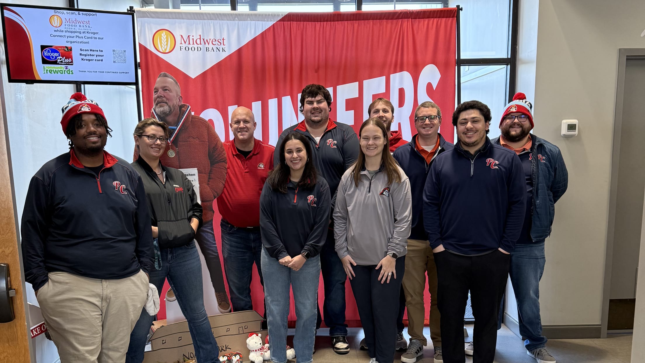 Peoria Chiefs staff members at a volunteer event.