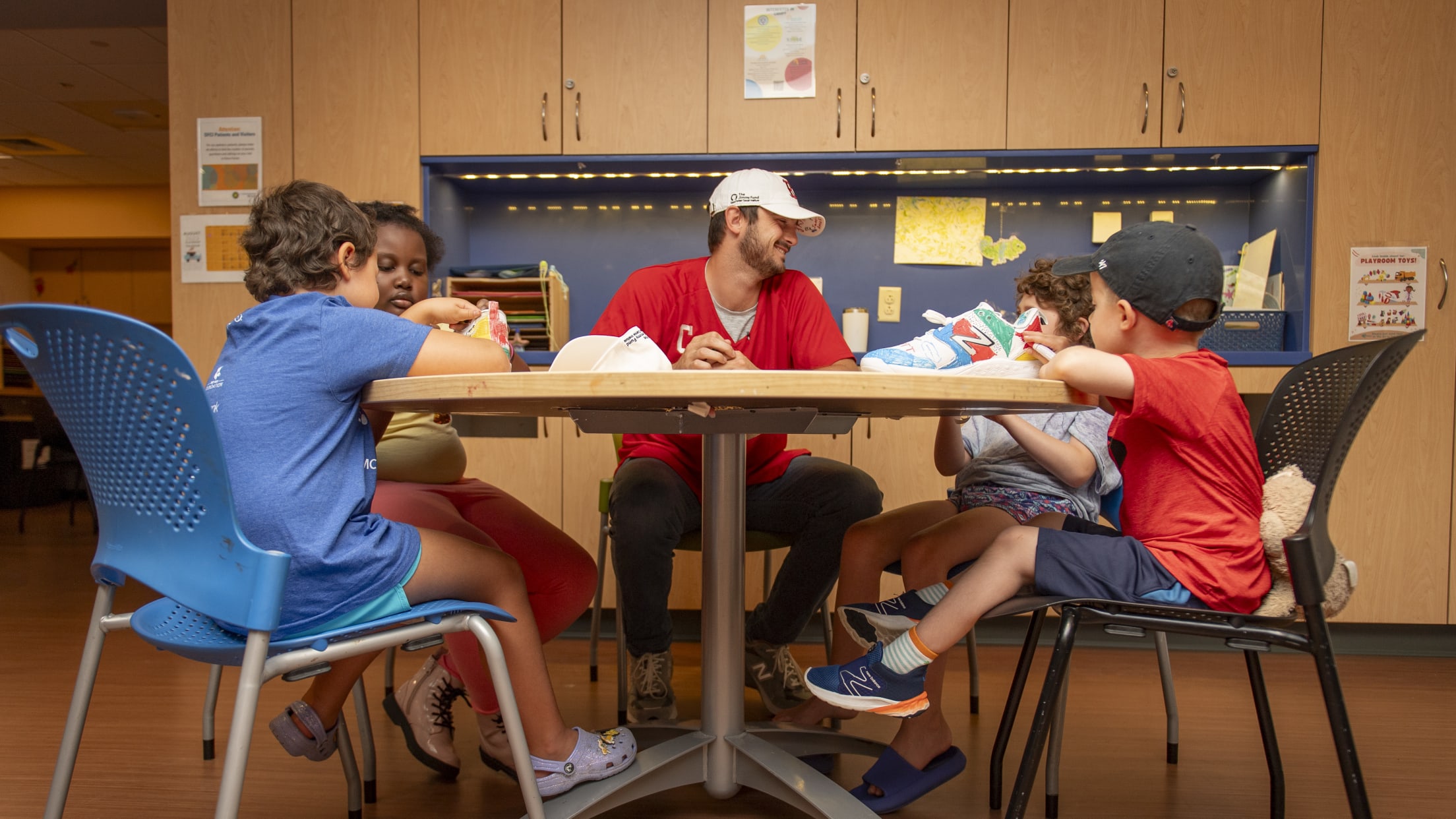 Garrett Whitlock hangs out with patients at the Dana-Farber Cancer Institute.