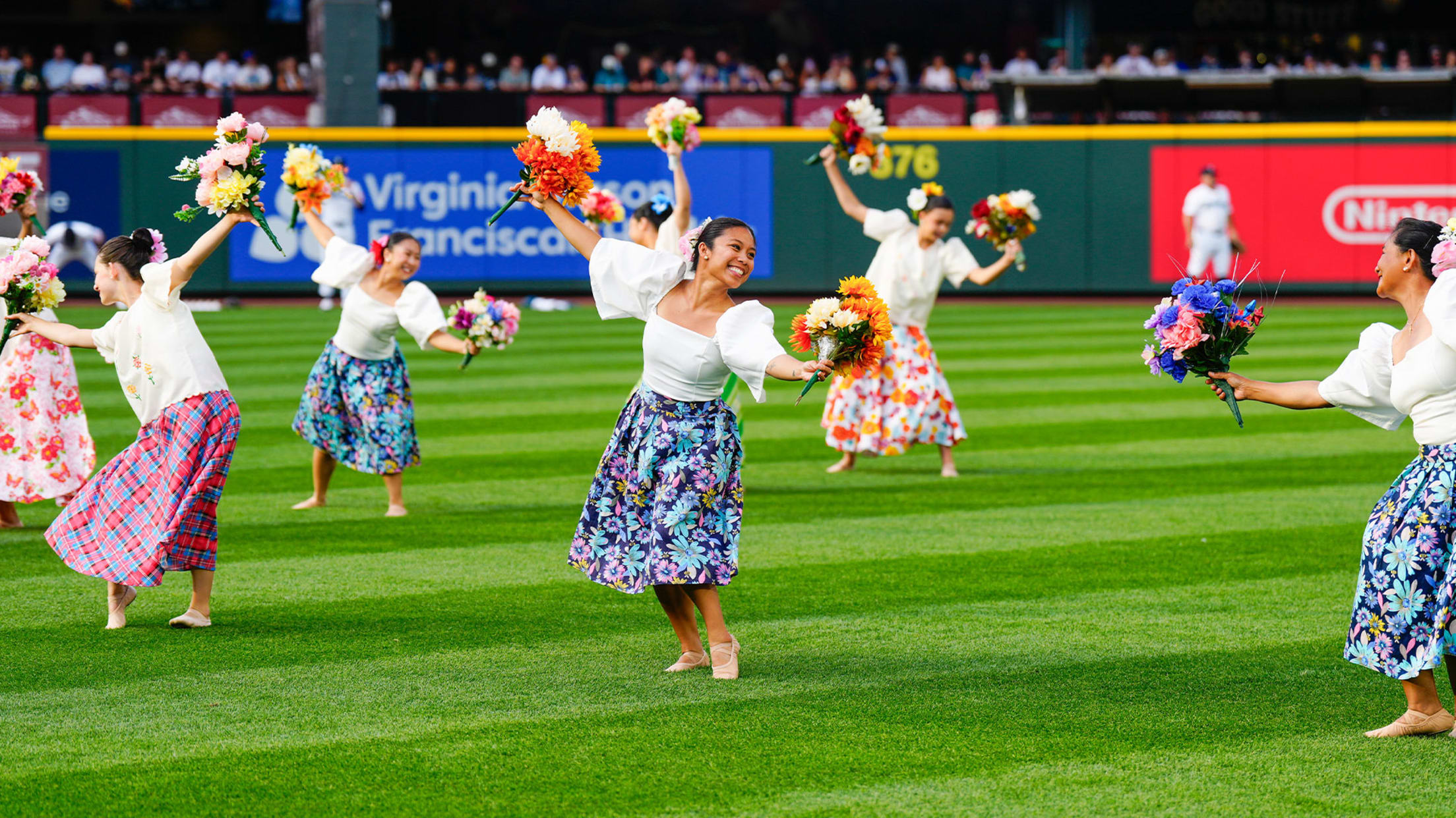 Image of dancers performing at T-Mobile Park.