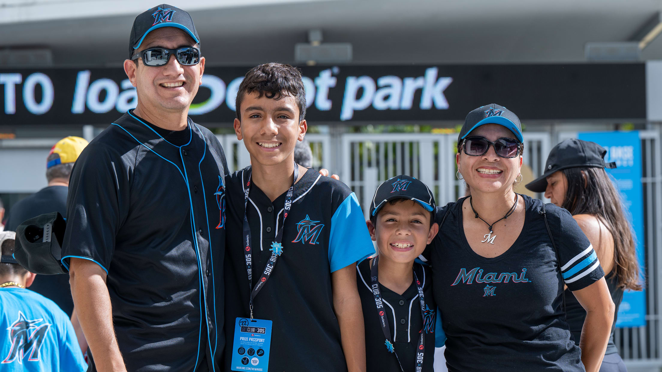Family celebrating at a Marlins game