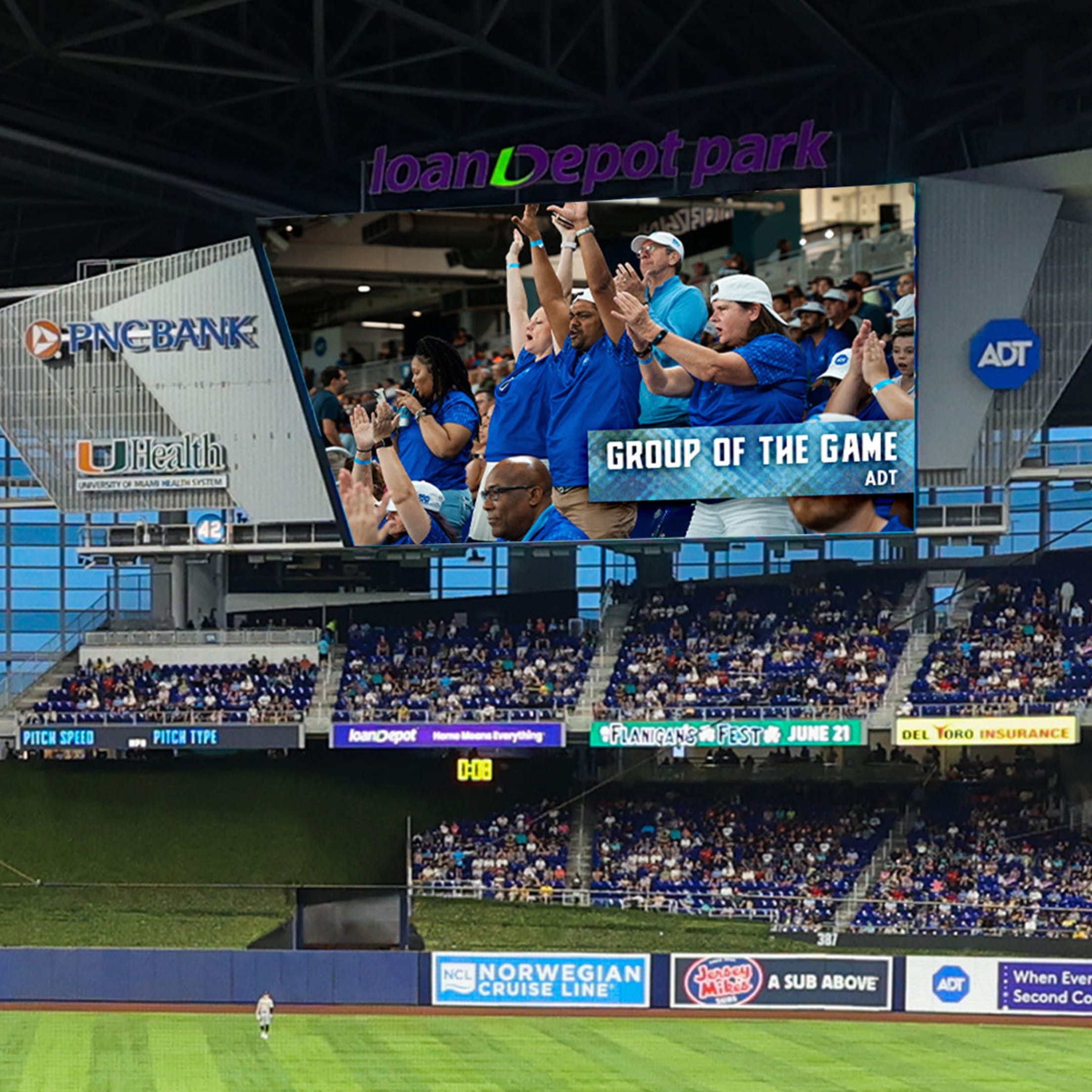 Fans on the jumbotron at loanDepot park