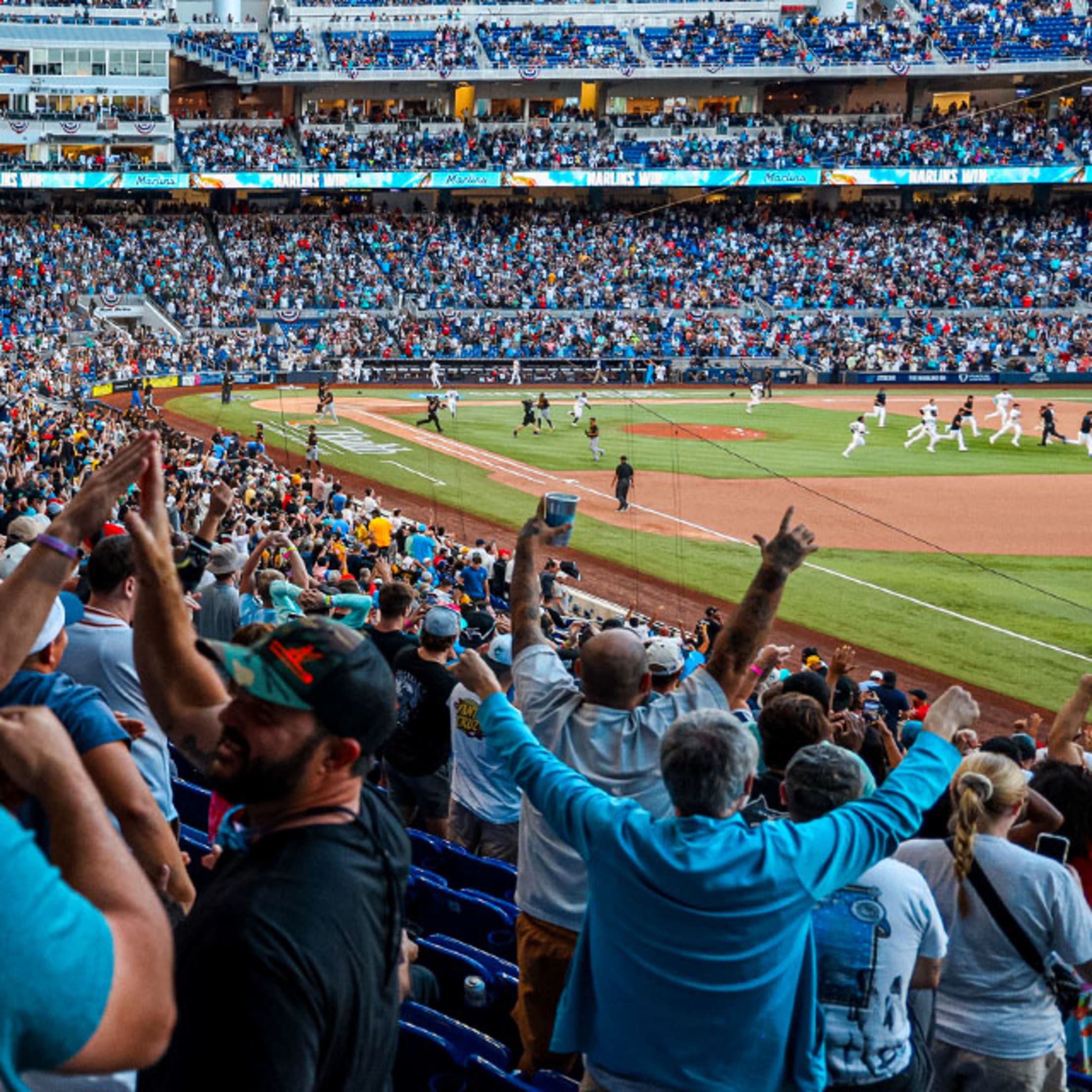 Fans celebrating at a Marlins game