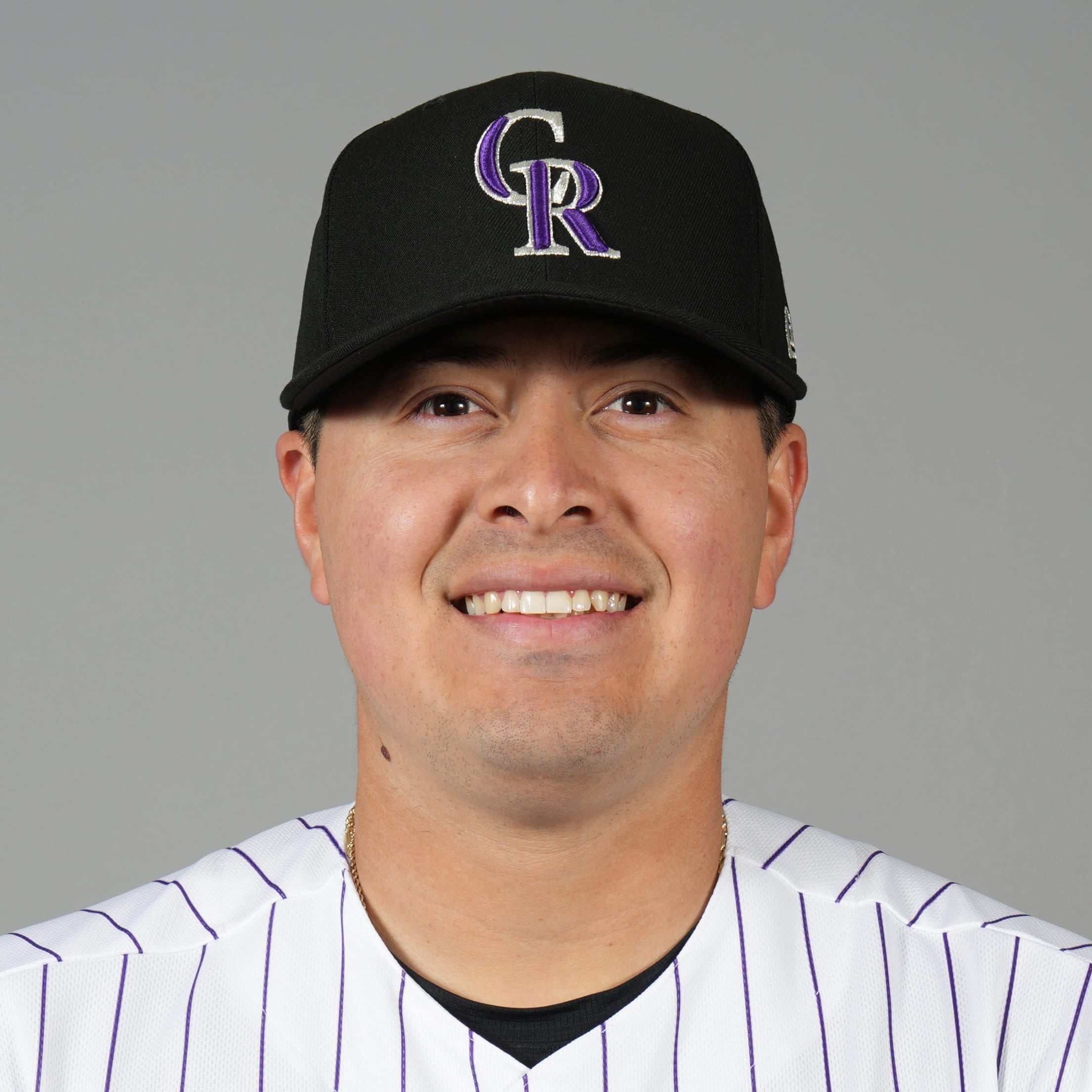 Headshot of Valente Bellozo.