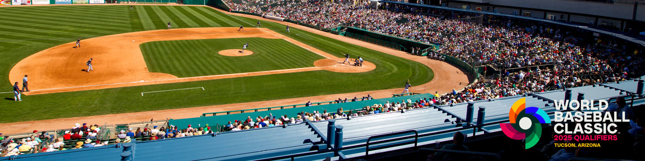 Image of players on baseball field at Veterans Memorial Stadium at Kino Sports Complex in Tucson, Arizona.