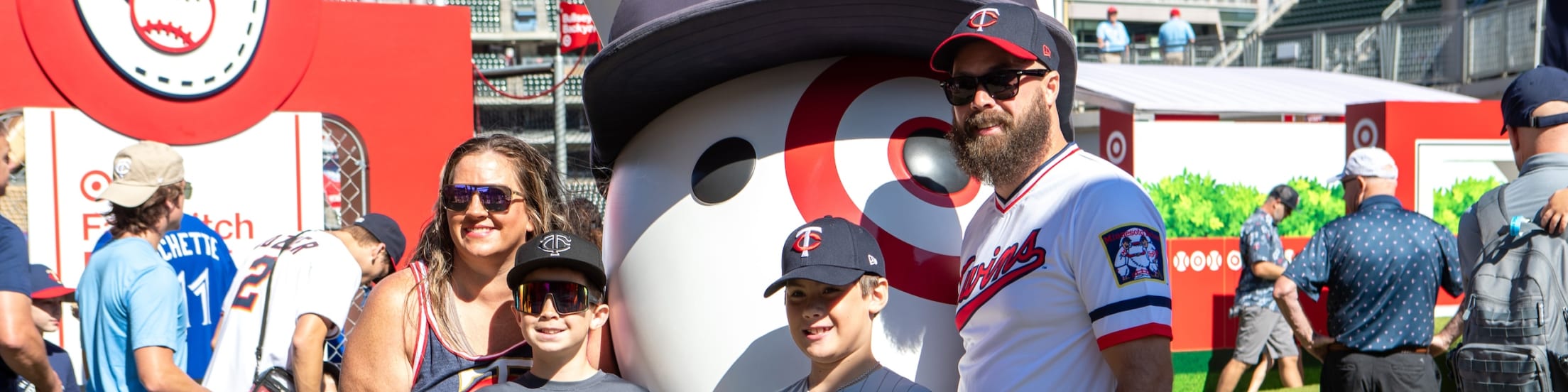 Family of four posing at Target Field