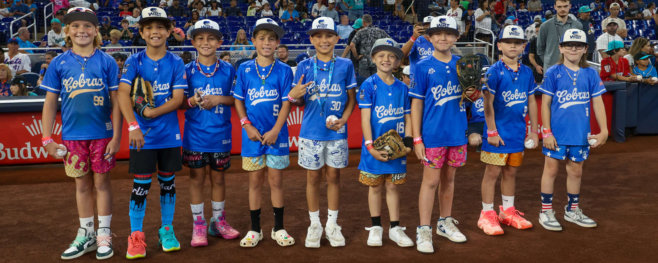 Kids on the field at a Marlins game