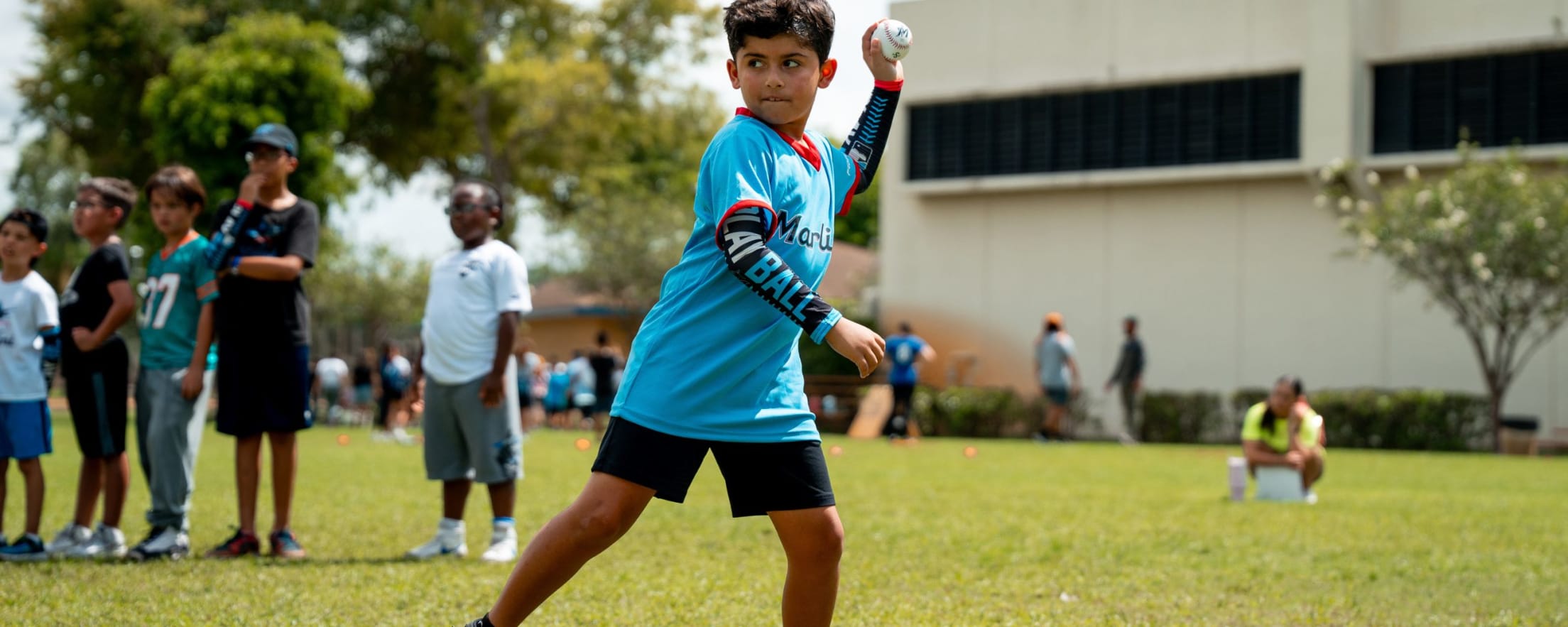 Youth baseball player throwing