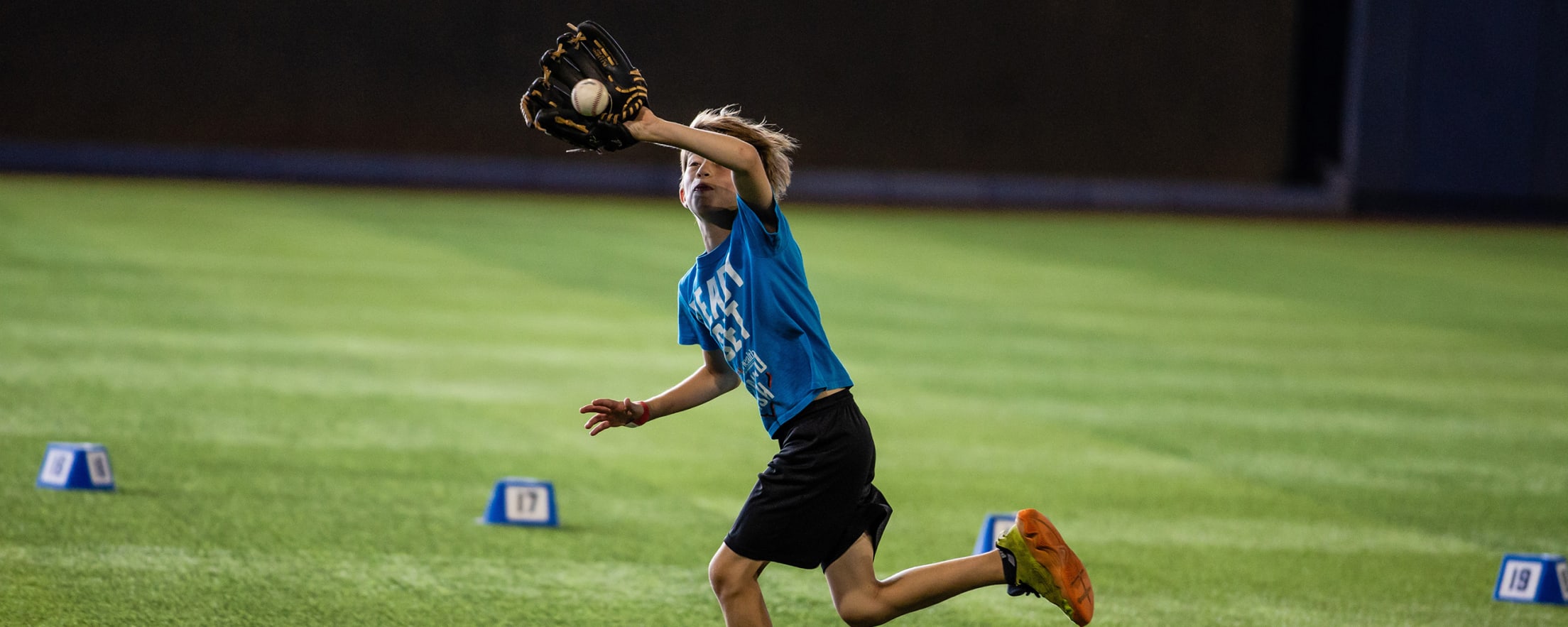 Playing catch on the field at a Marlins game
