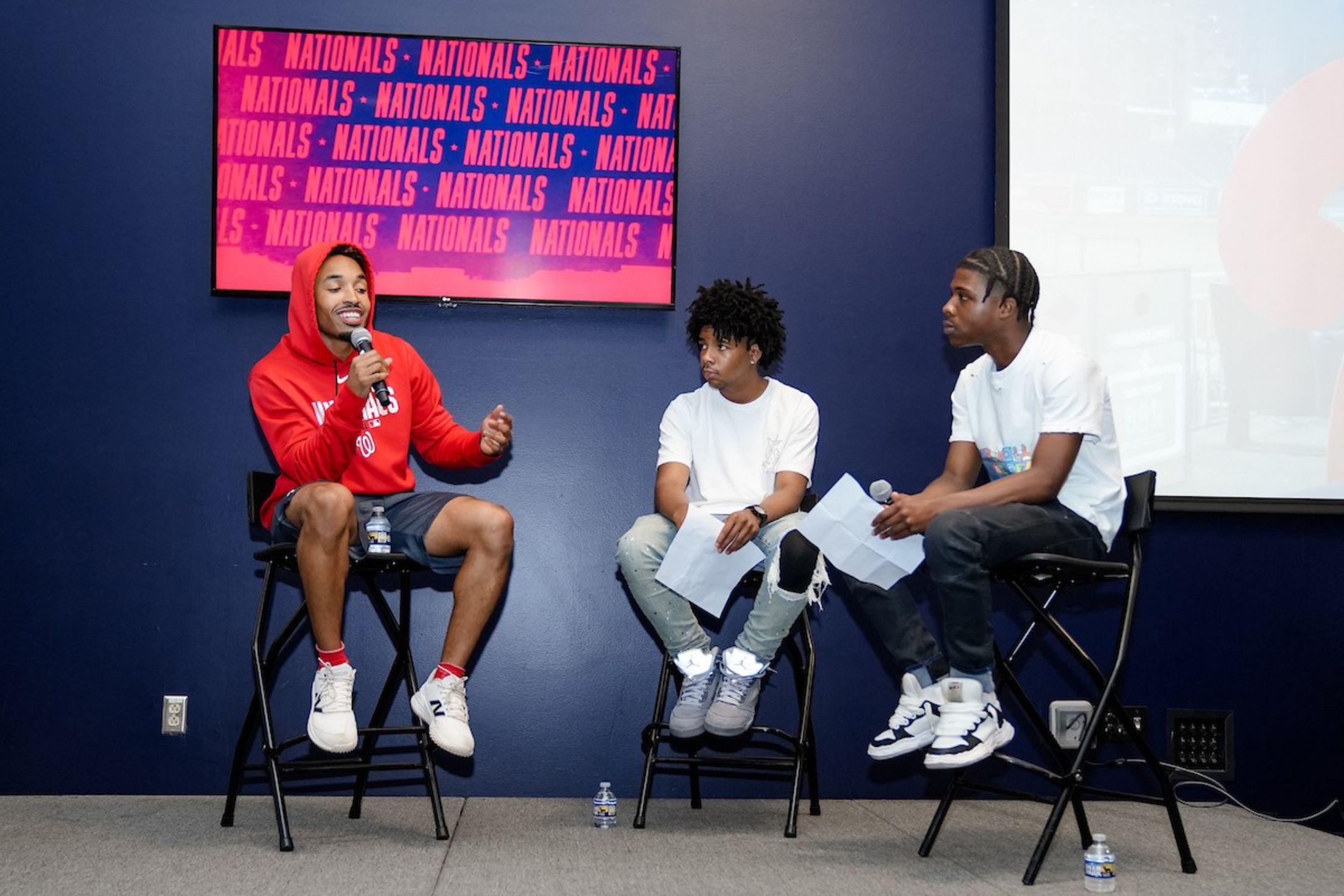 Nasim Nuñez speaks on a panel with young adults from the District of Columbia Interscholastic Athletic Association (DCIAA).