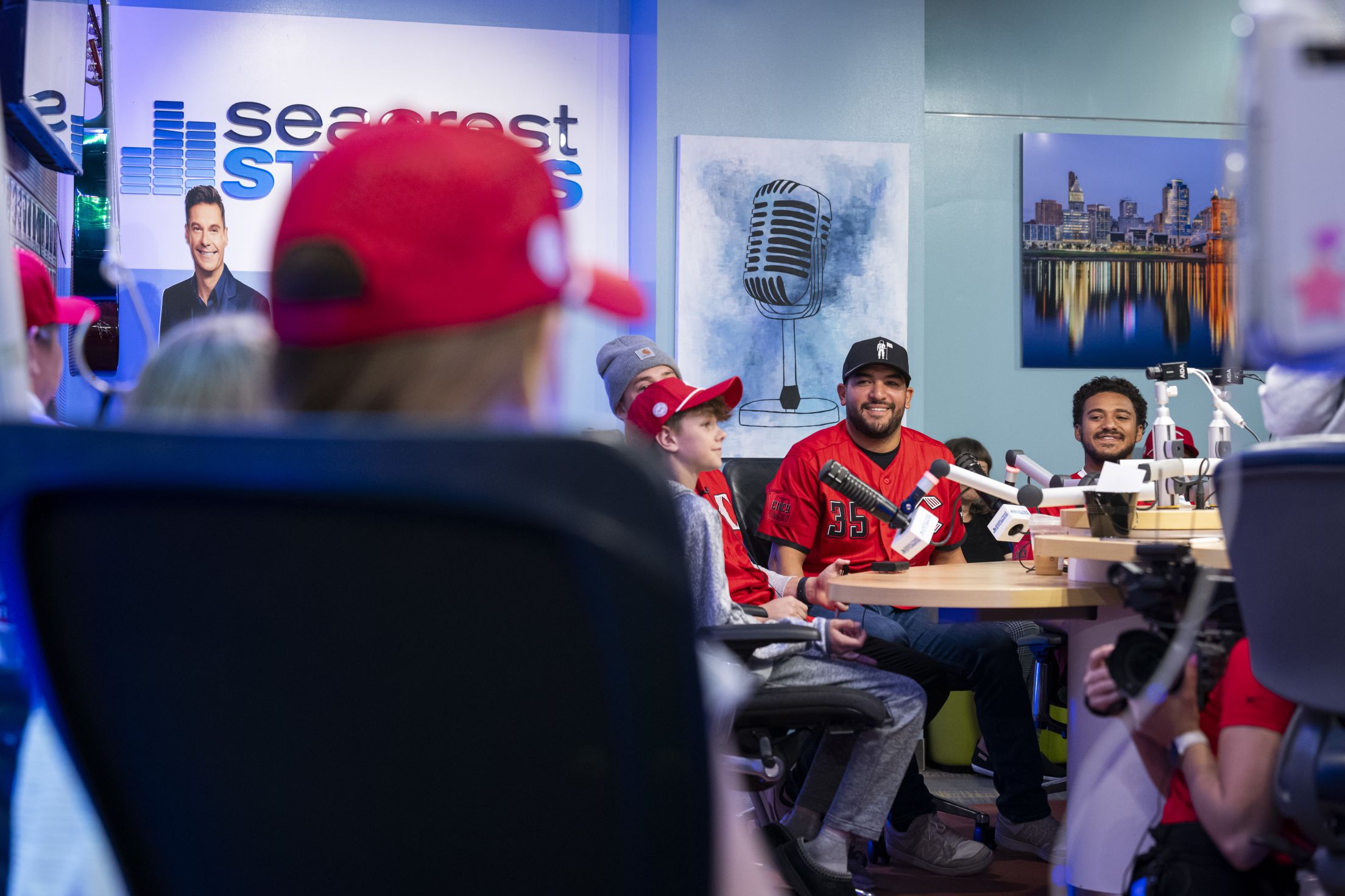 Jose Trevino joins kids on a radio show.