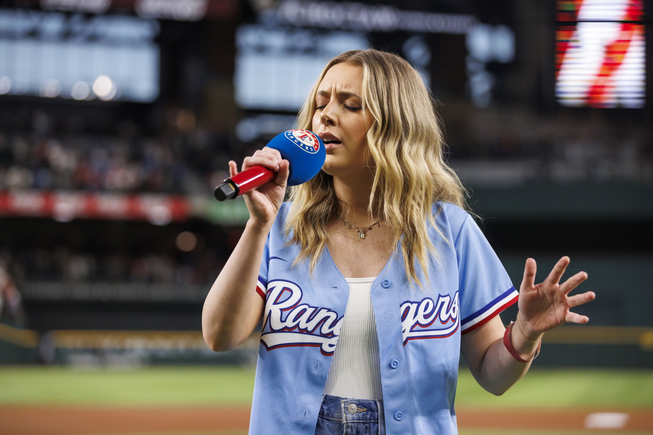 Young lady singing the national anthem at Globe Life Field