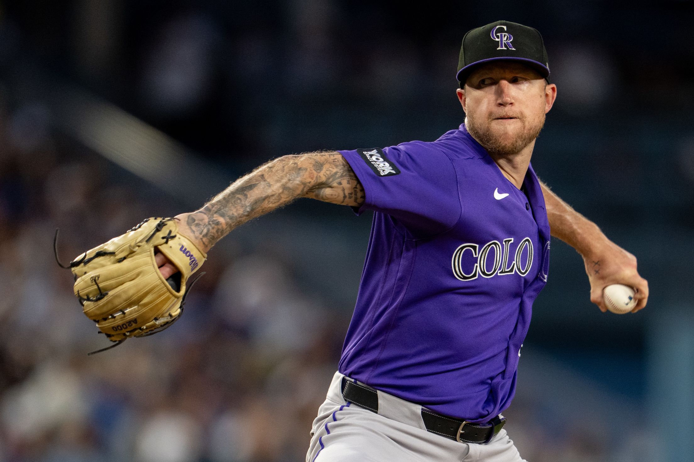 Kyle Freeland throws a pitch on the hill.