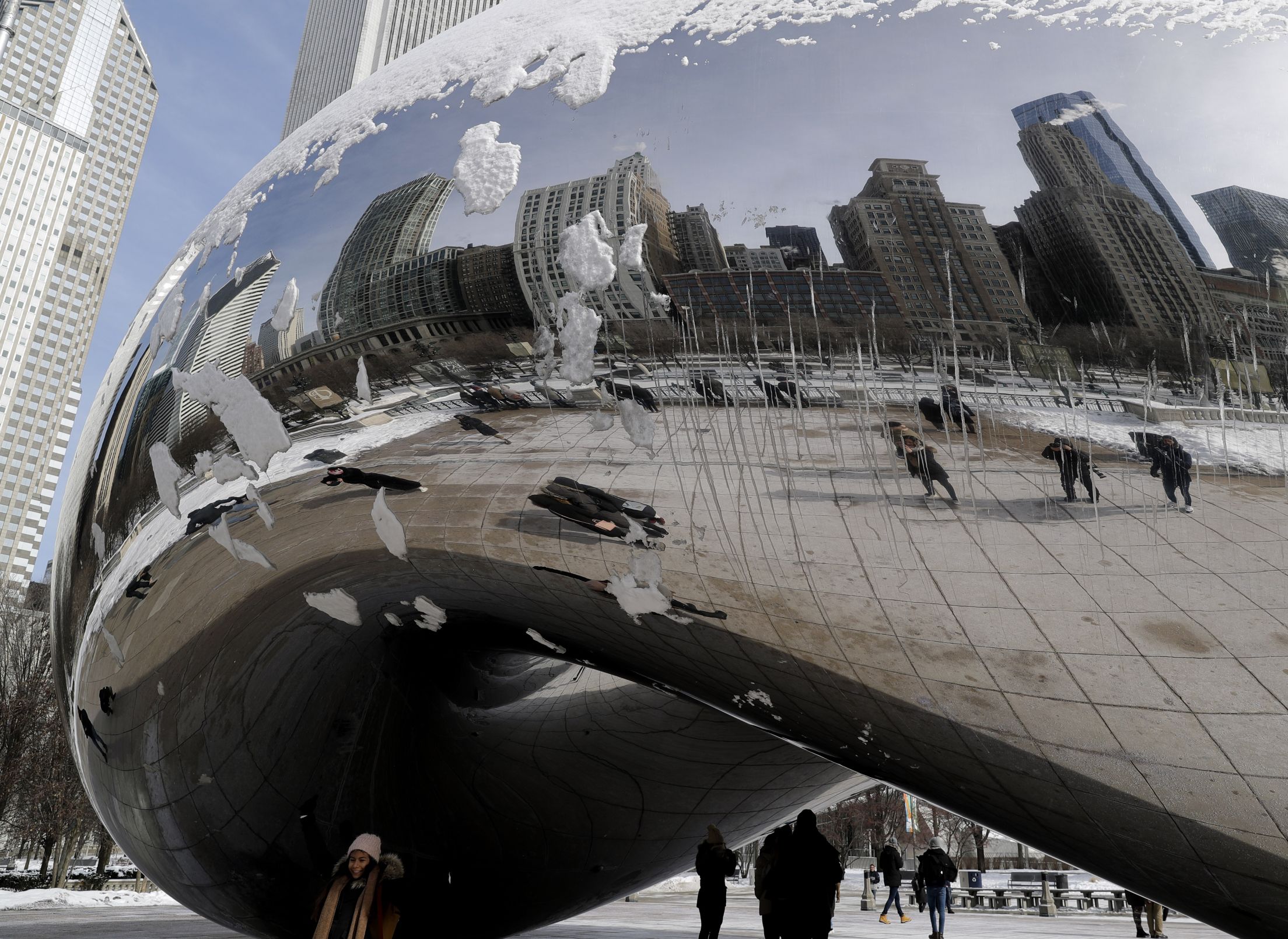 cloud-gate-bean-snow-reflecting-skyline