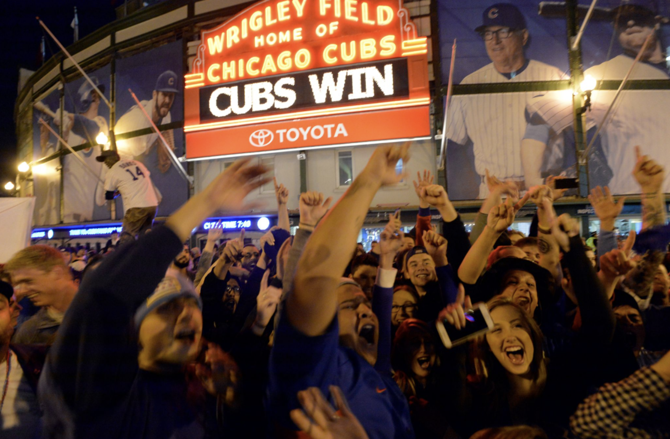 cubs-fans-celebrating-wrigley-victory
