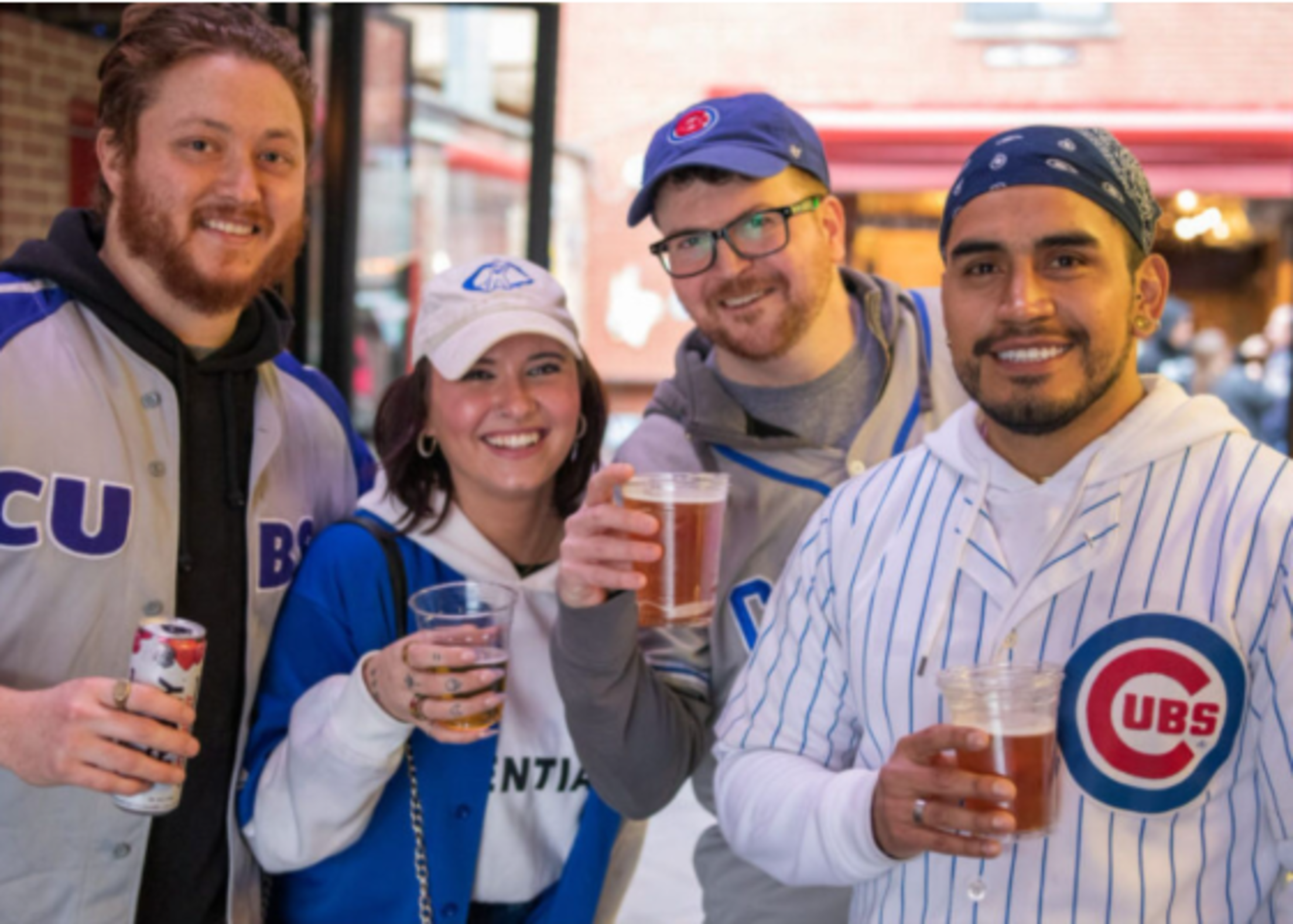 cubs-fans-holding-beers-wrigleyville