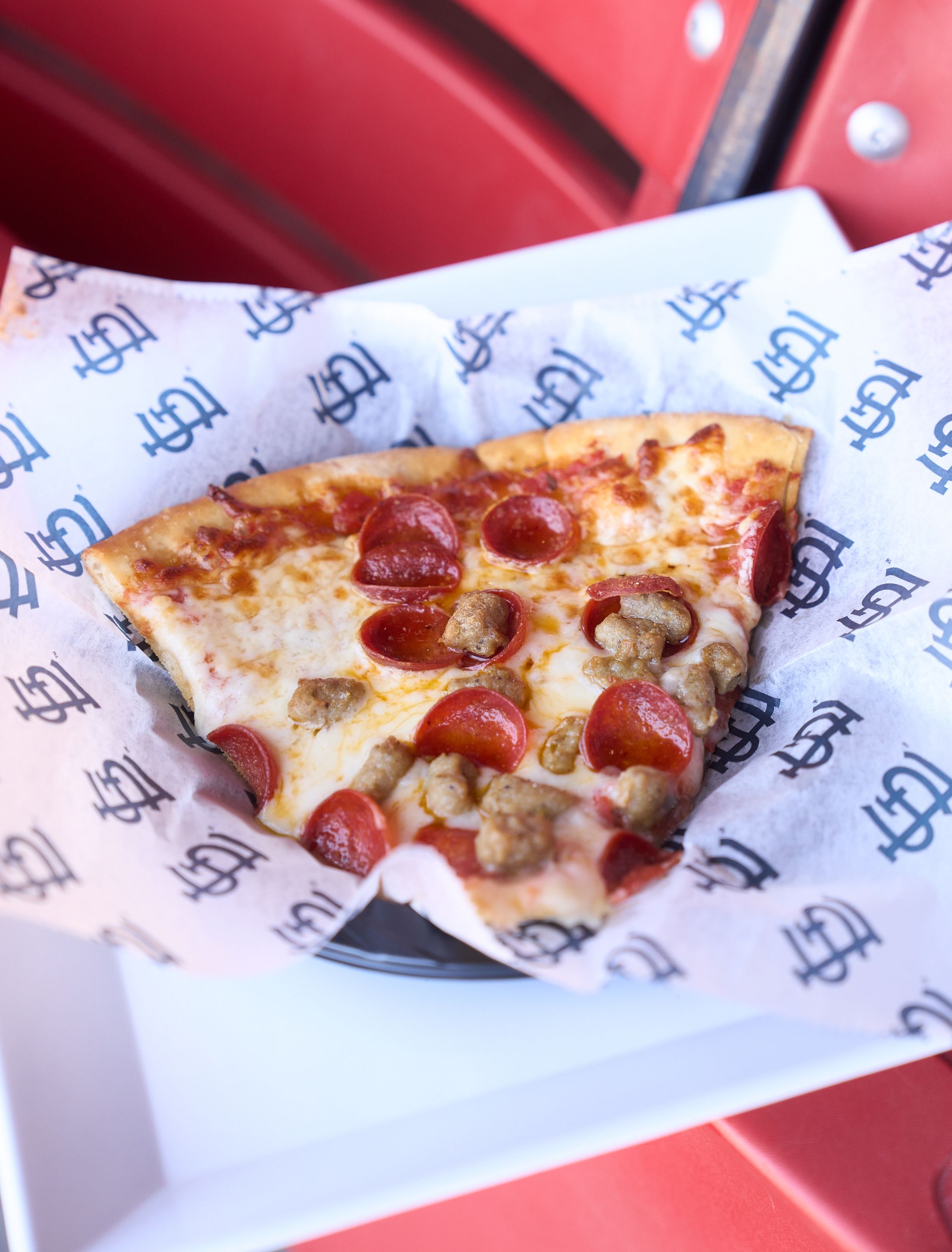 Pizza handtossed by the slice