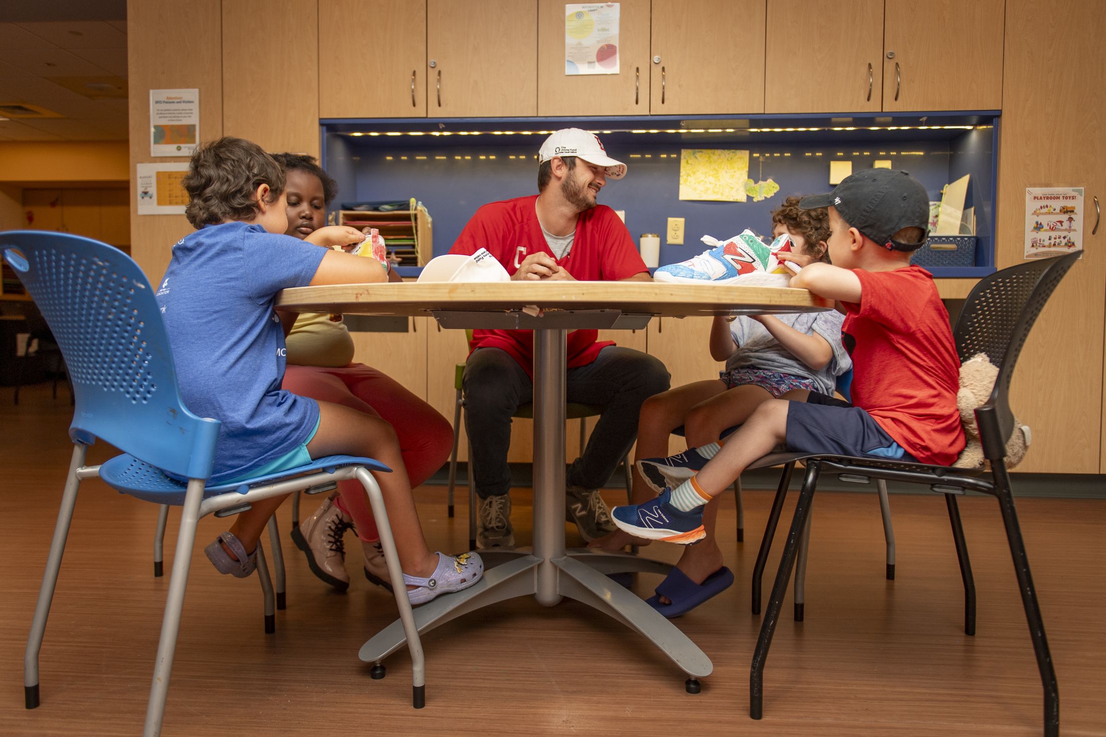 Garrett Whitlock hangs out with patients at the Dana-Farber Cancer Institute.