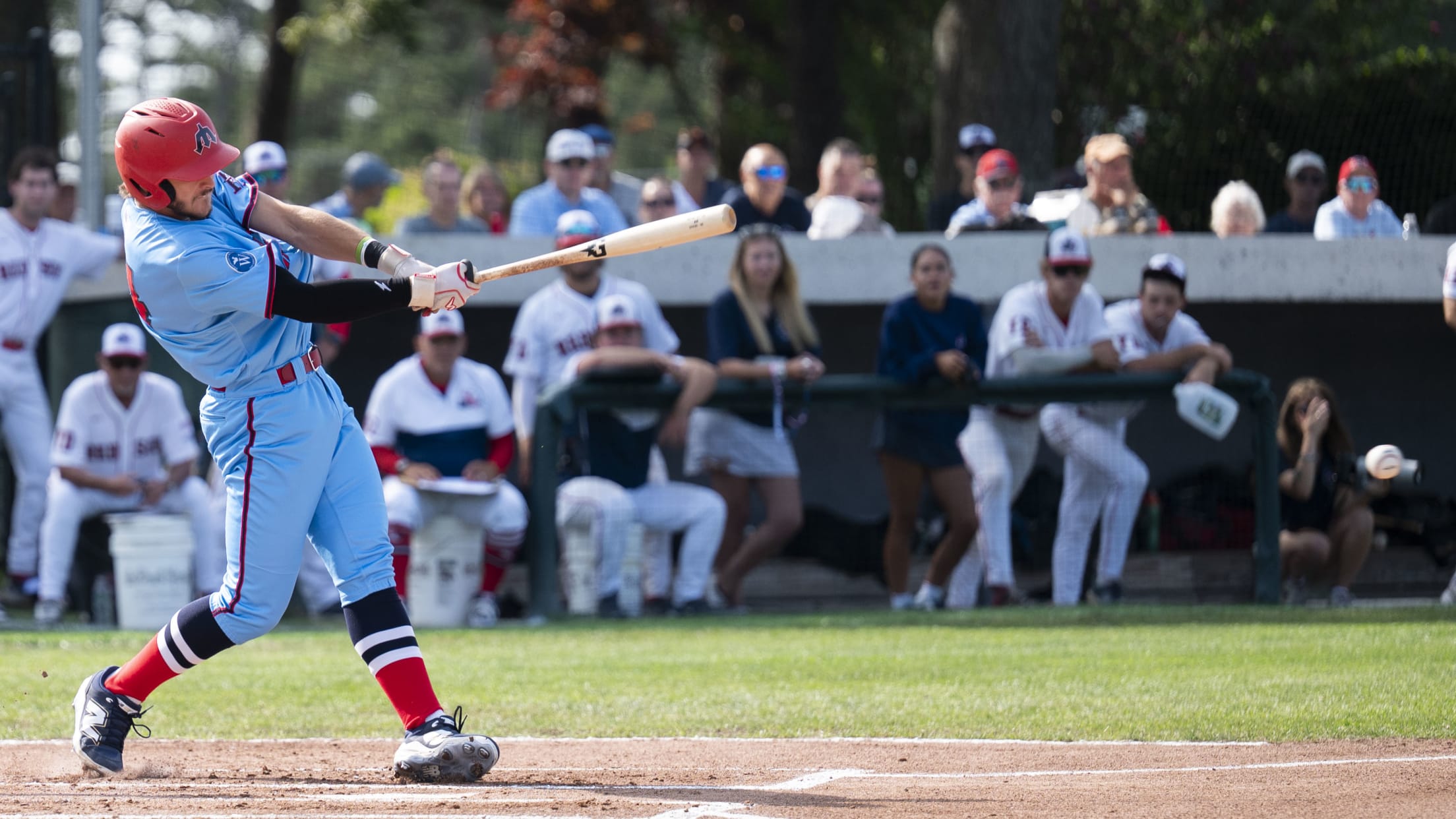 Aiden Robbins follows through in his swing.