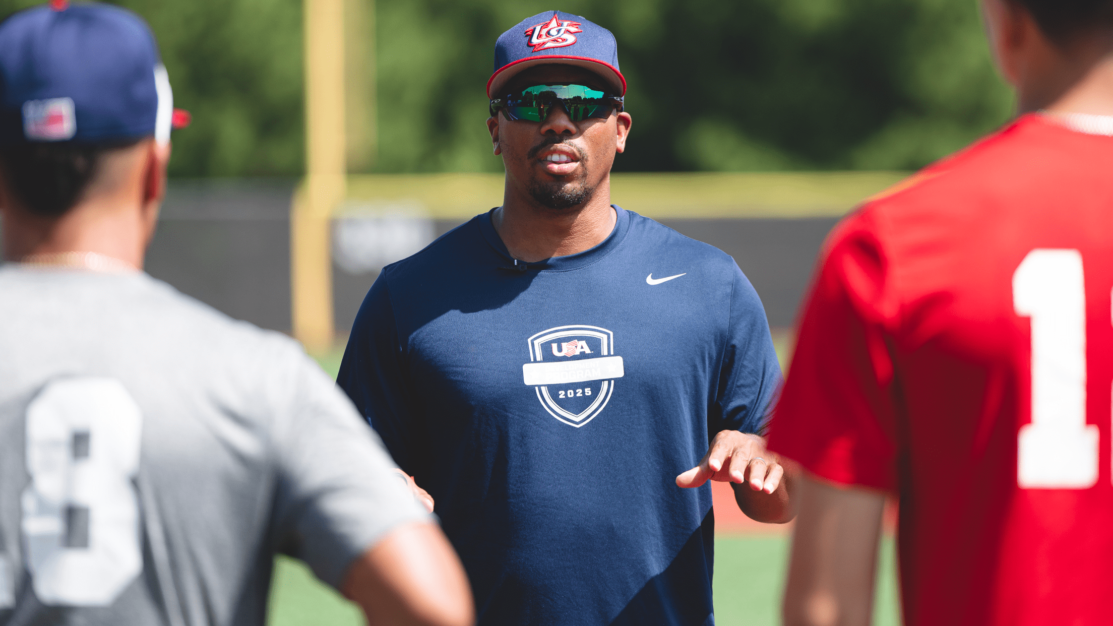 Baseball coach giving instruction