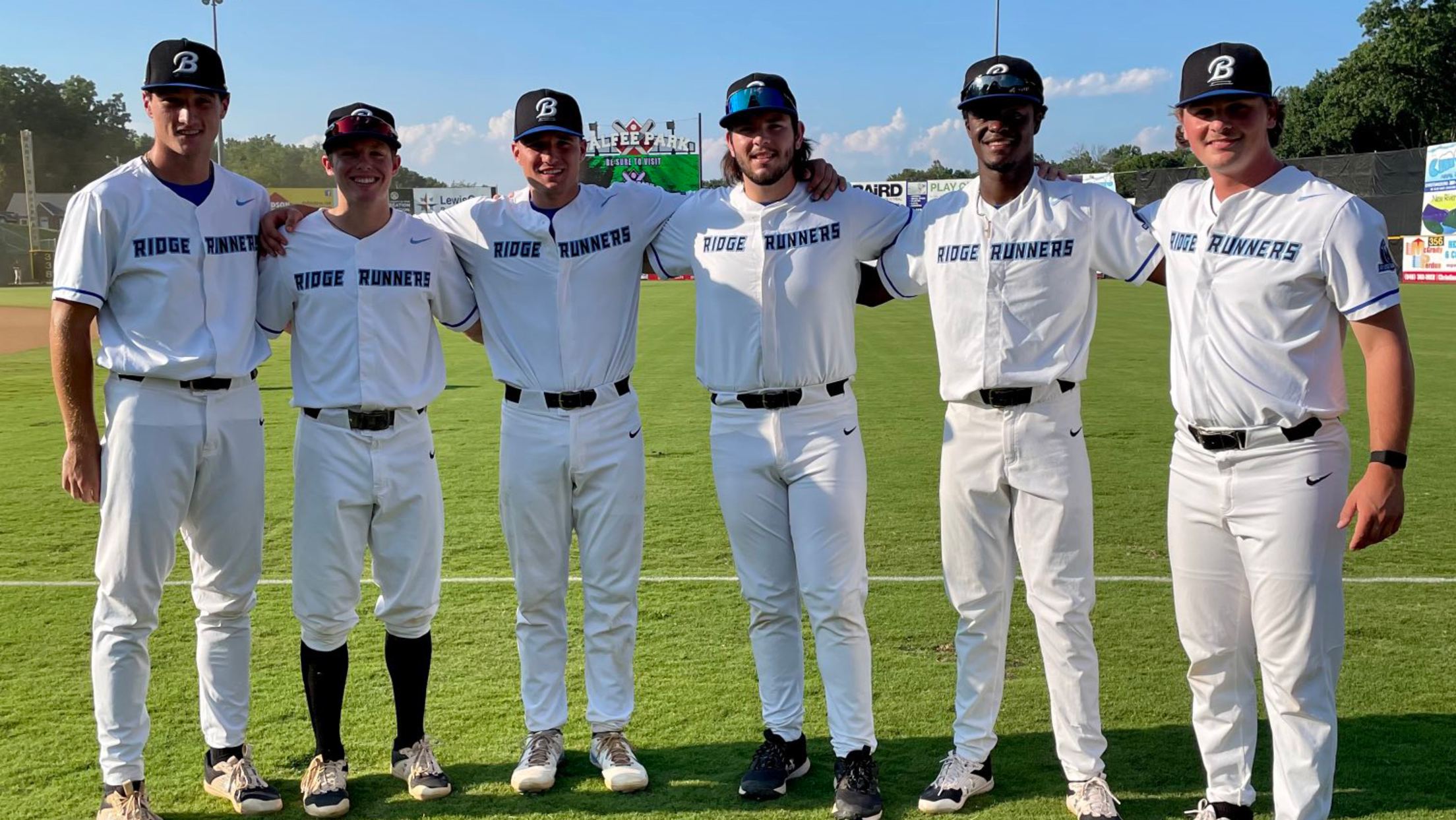 Bluefield players pose near foul line