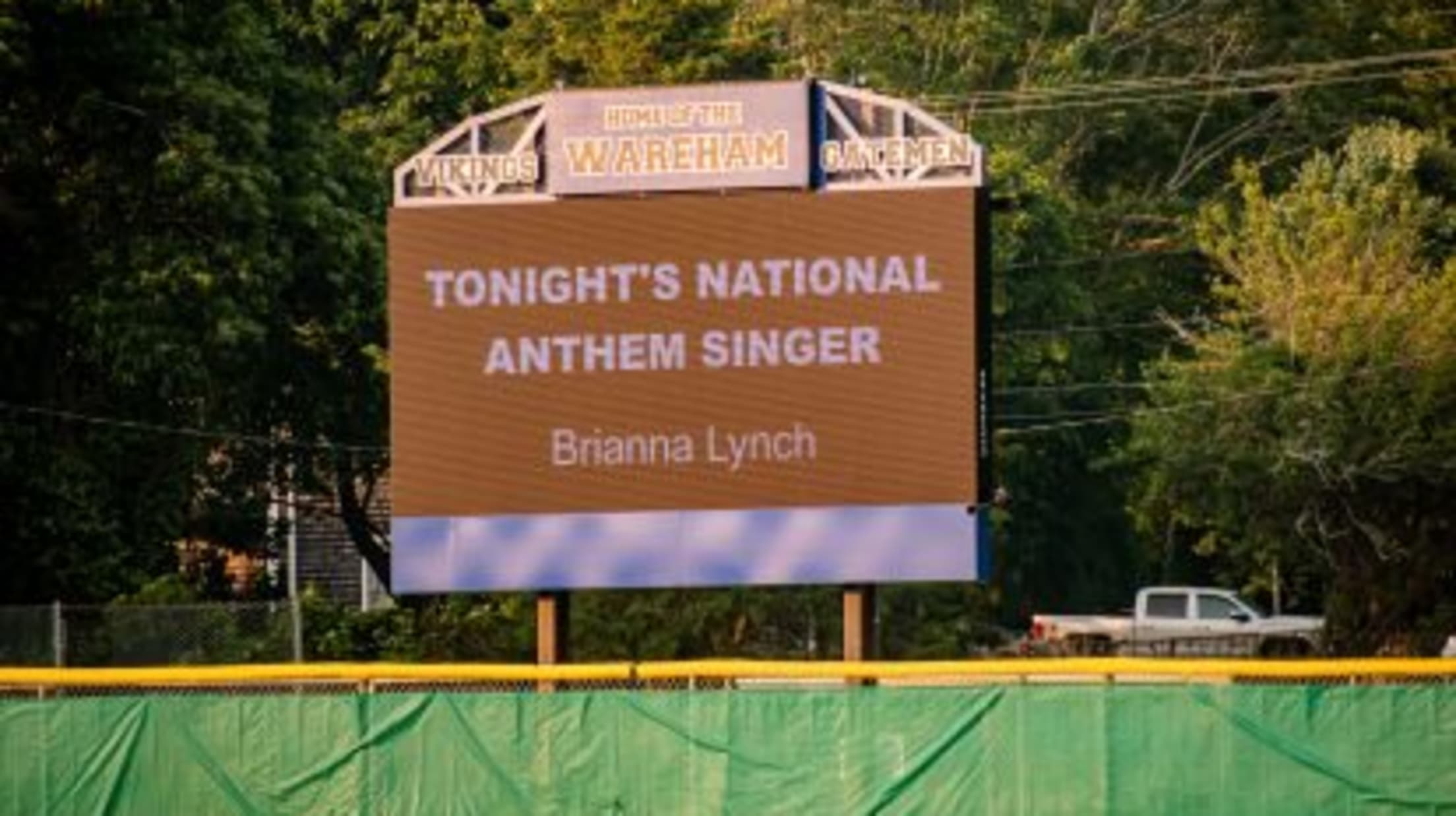 Spillane Field videoboard, announcing the day's national anthem singer.
