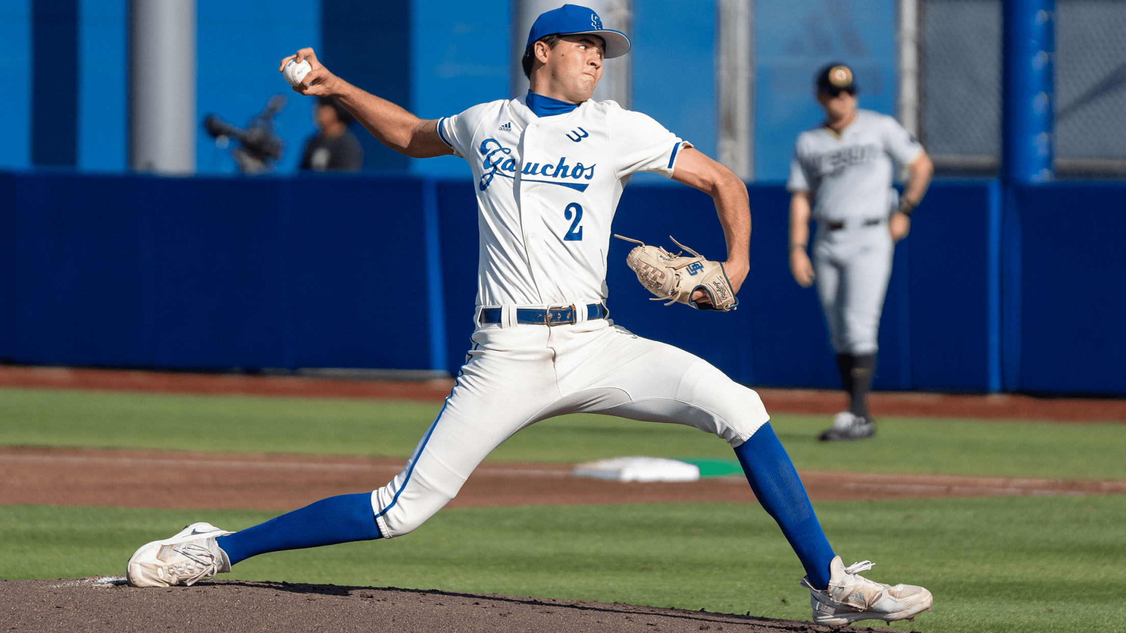 UC Santa Barbara pitcher Jackson Flora mid-pitching delivery.
