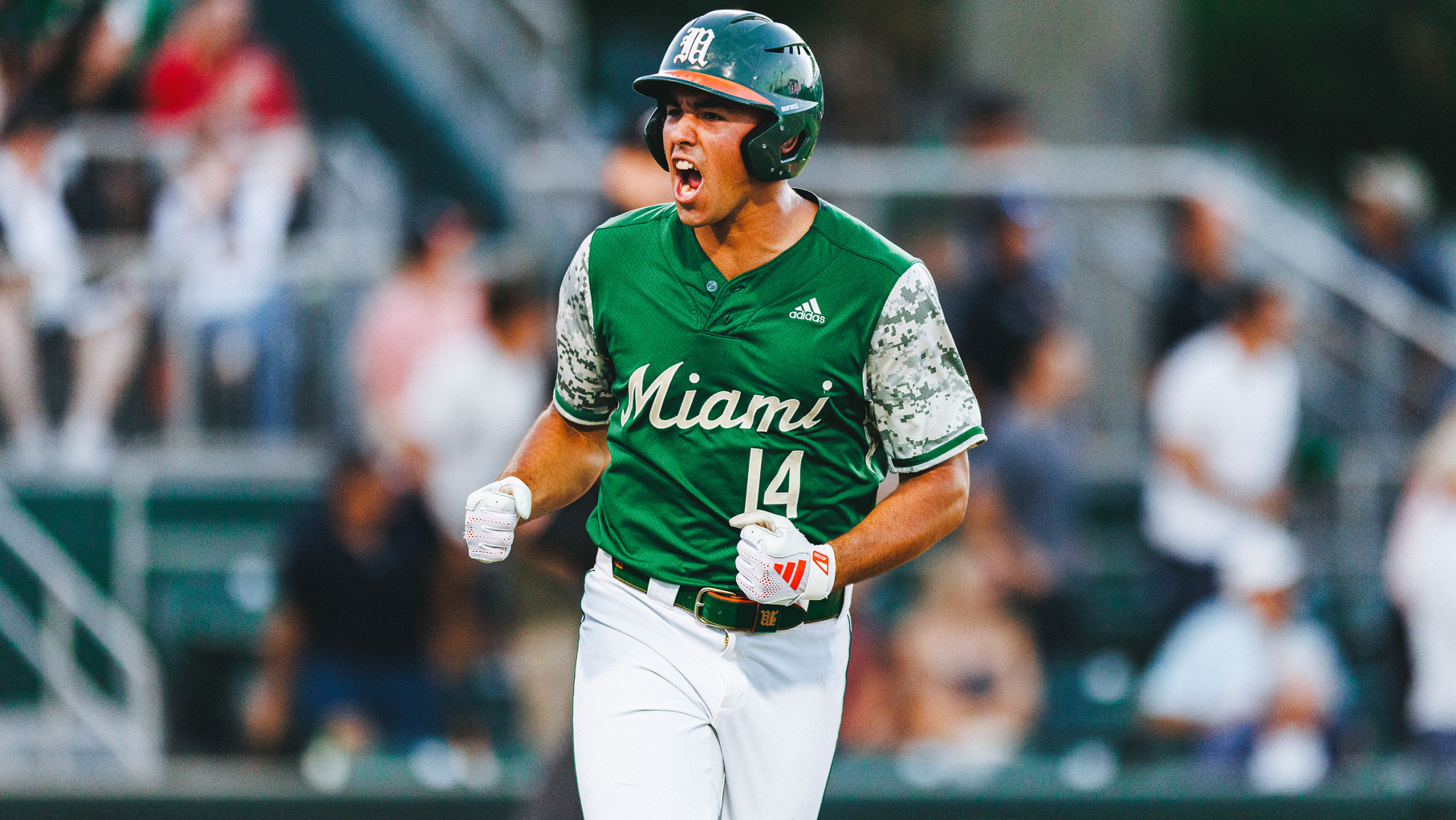 Miami infielder Daniel Cuvet celebrates a home run.