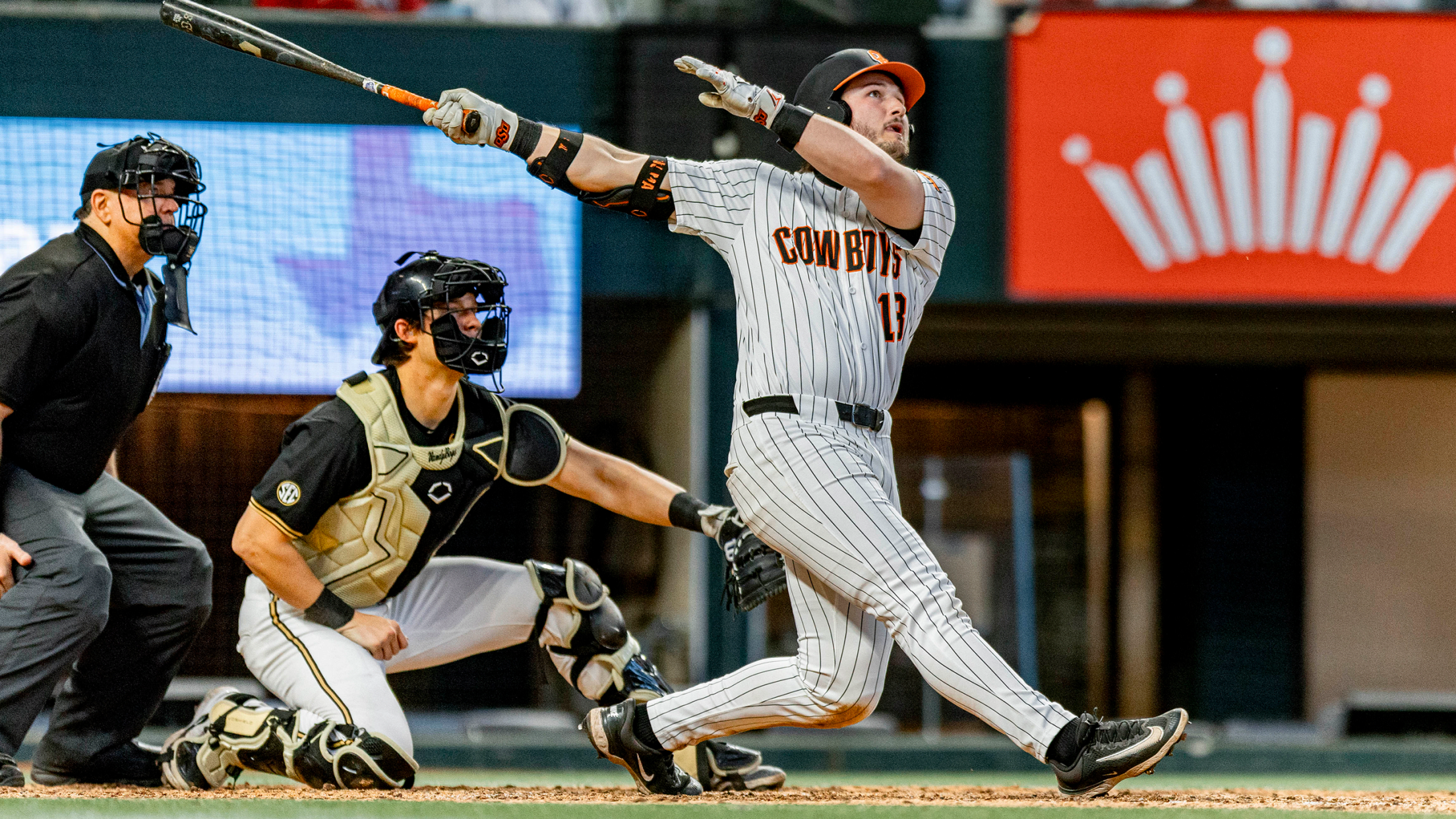 Oklahoma State outfielder Kollin Ritchie watches his walk-off home run fly.