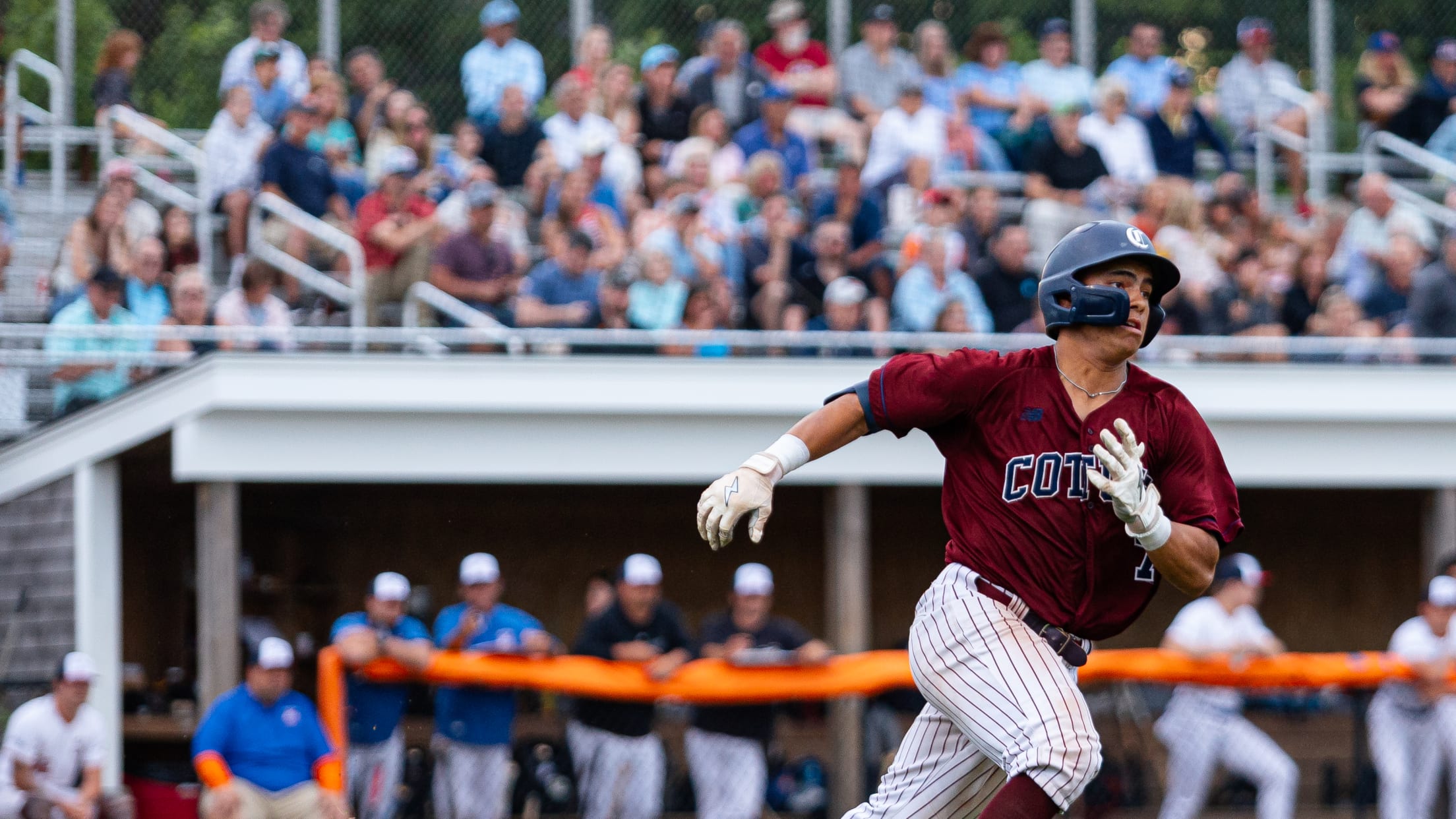 Jarren Advincula rounding first base.