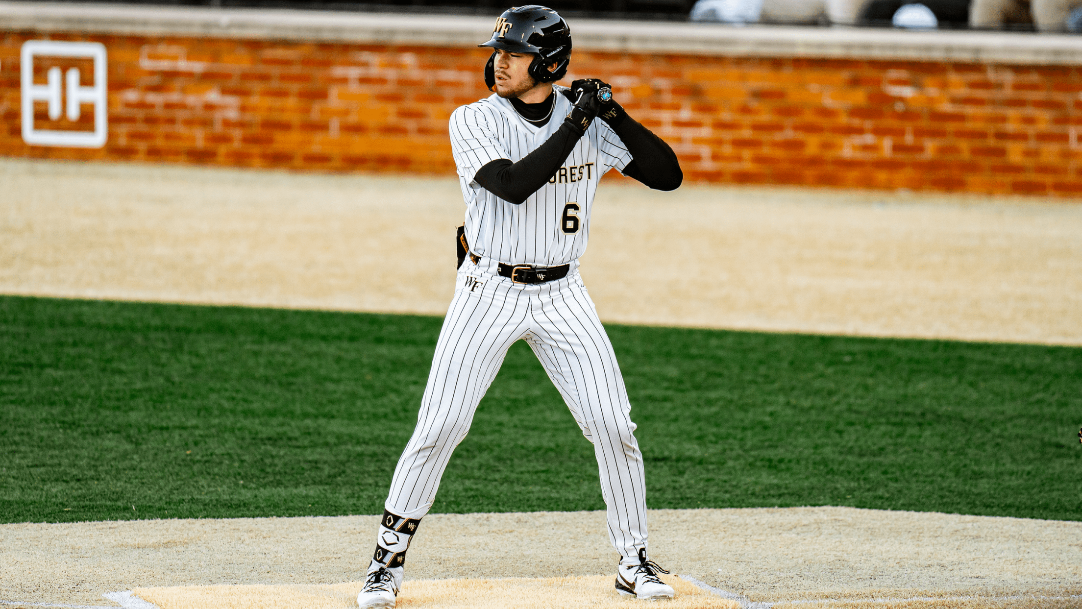Wake Forest infielder Kade Lewis stands at the plate in the batter's box.