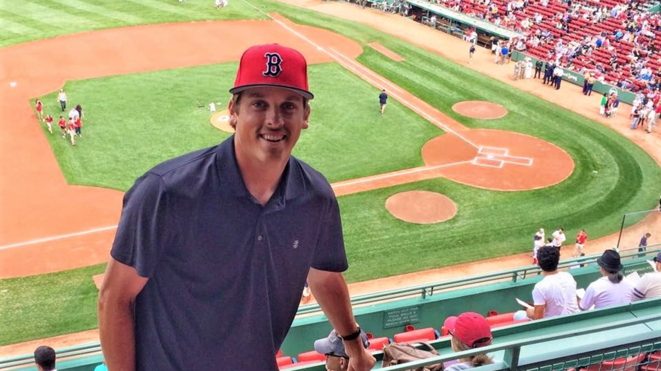 Cotuit Kettleers pitcher Kevin Ginkel takes in a game at Fenway Park.