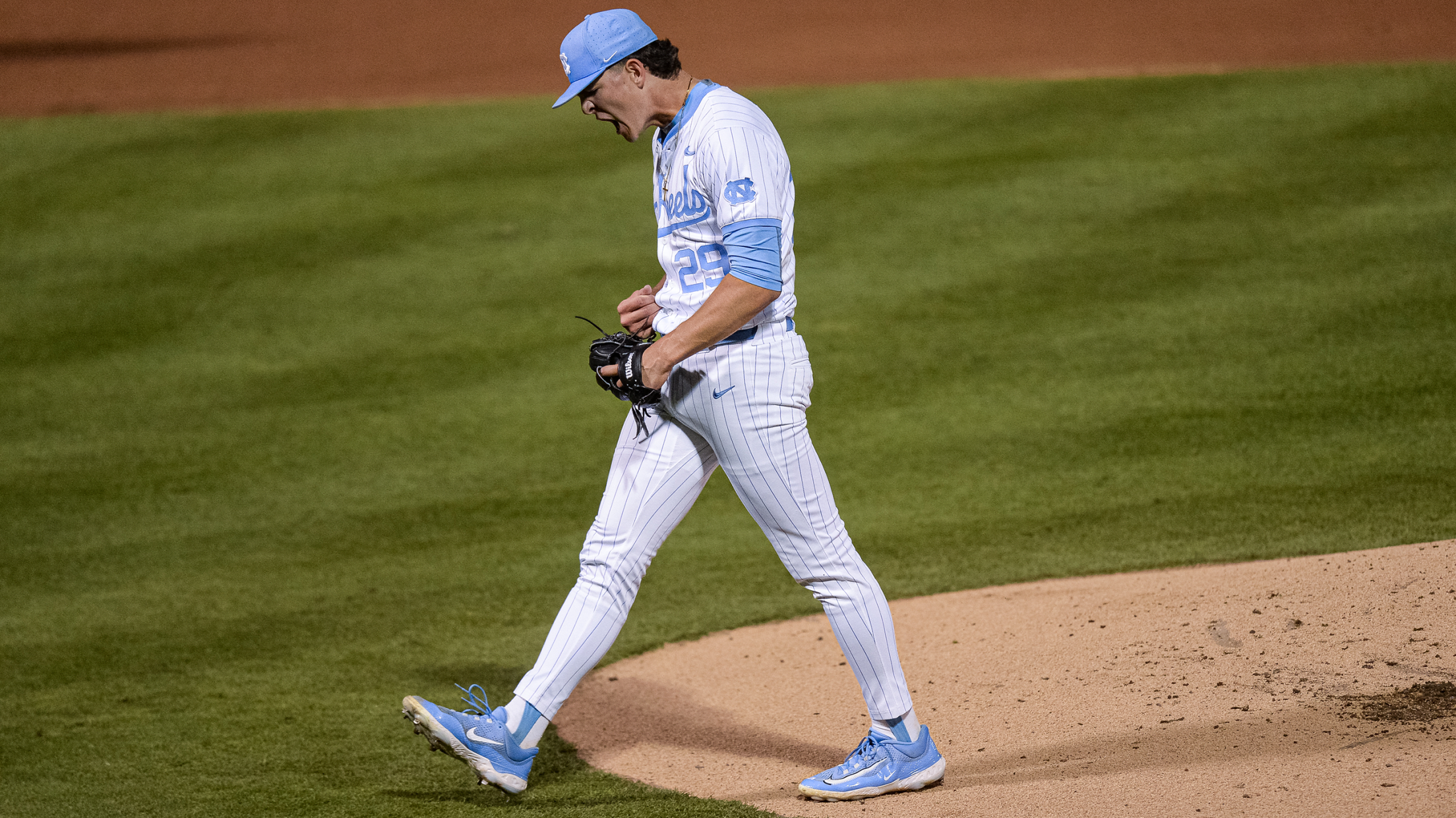 North Carolina pitcher Jason DeCaro celebrates while walking off the mound