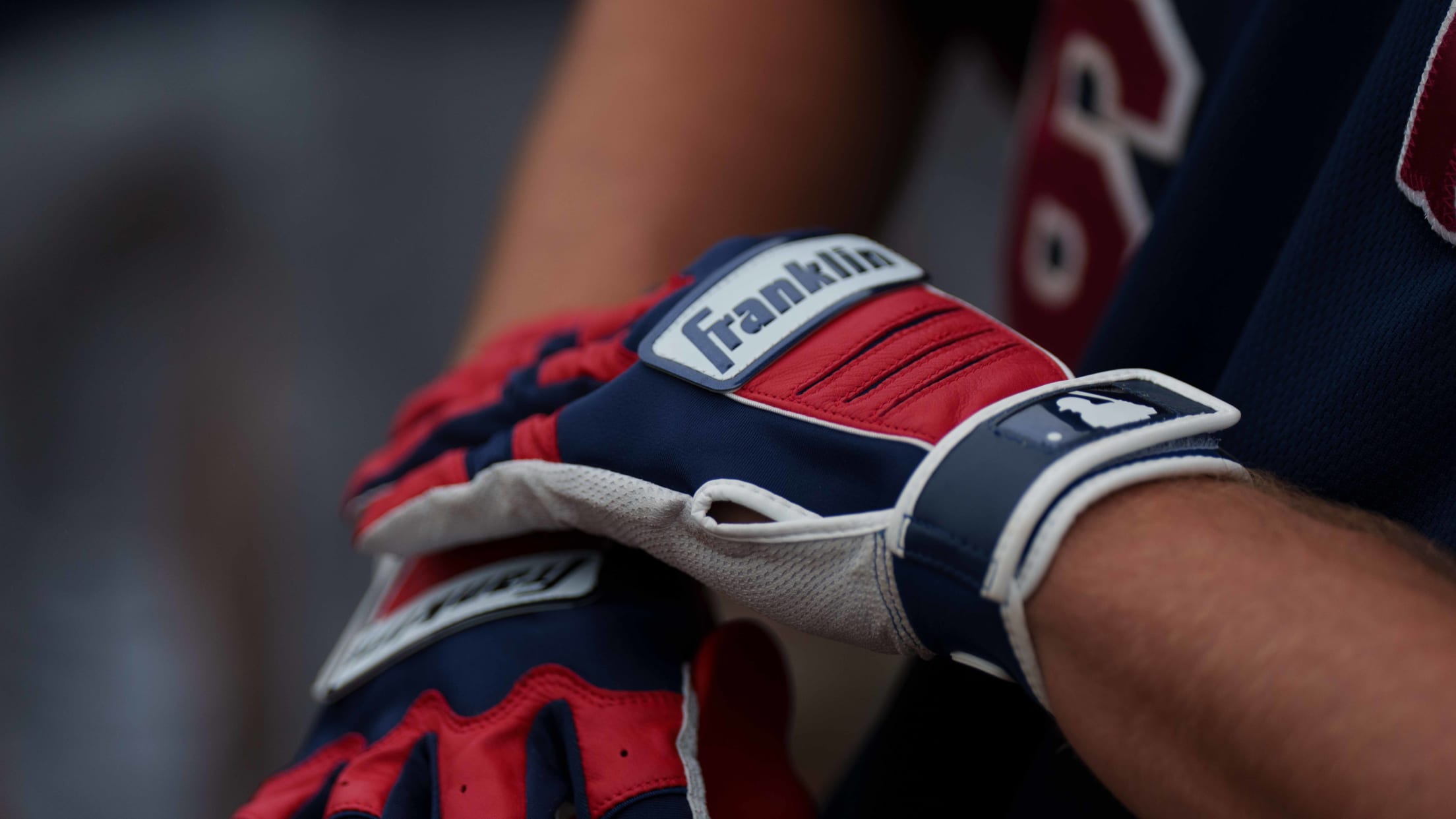 Franklin batting gloves on a Wareham player's hands.