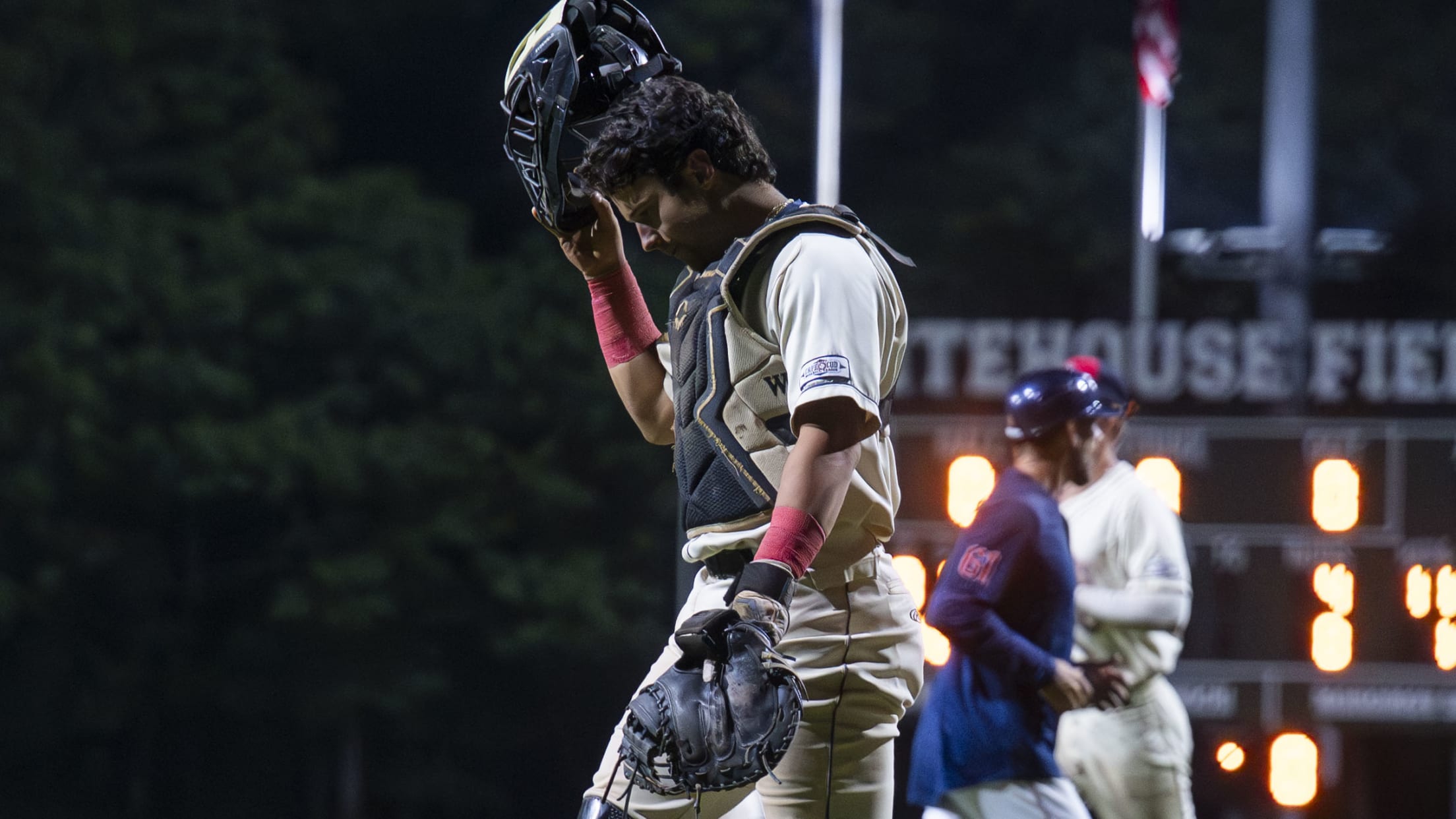 Matt Conte walks back to the dugout between innings.