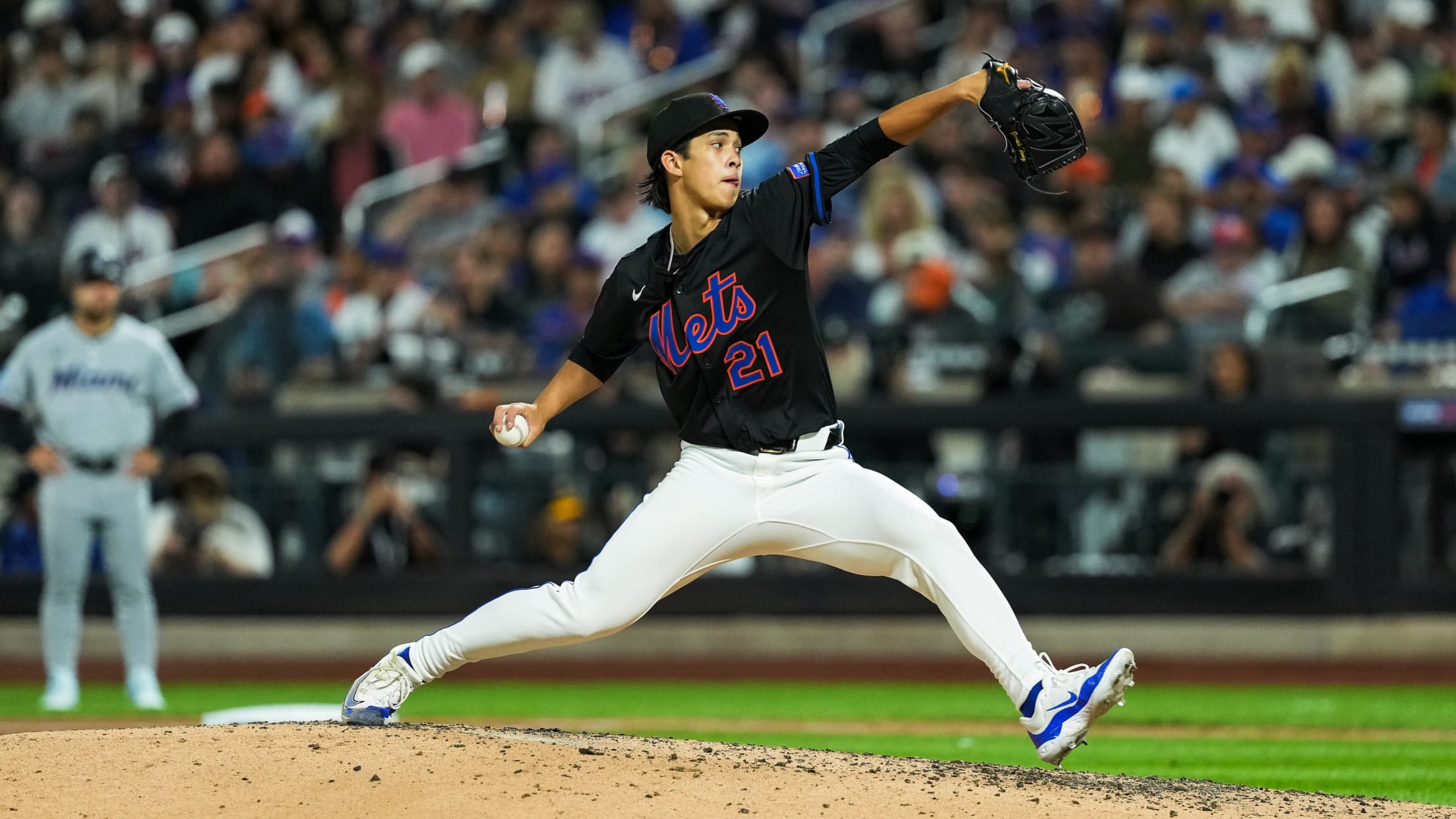 Jonah Tong delivers a pitch for the New York Mets in his MLB debut at Citi Field.