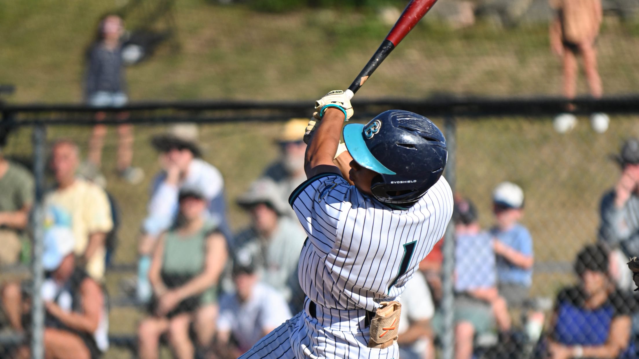 Adam Magpoc makes a swing
