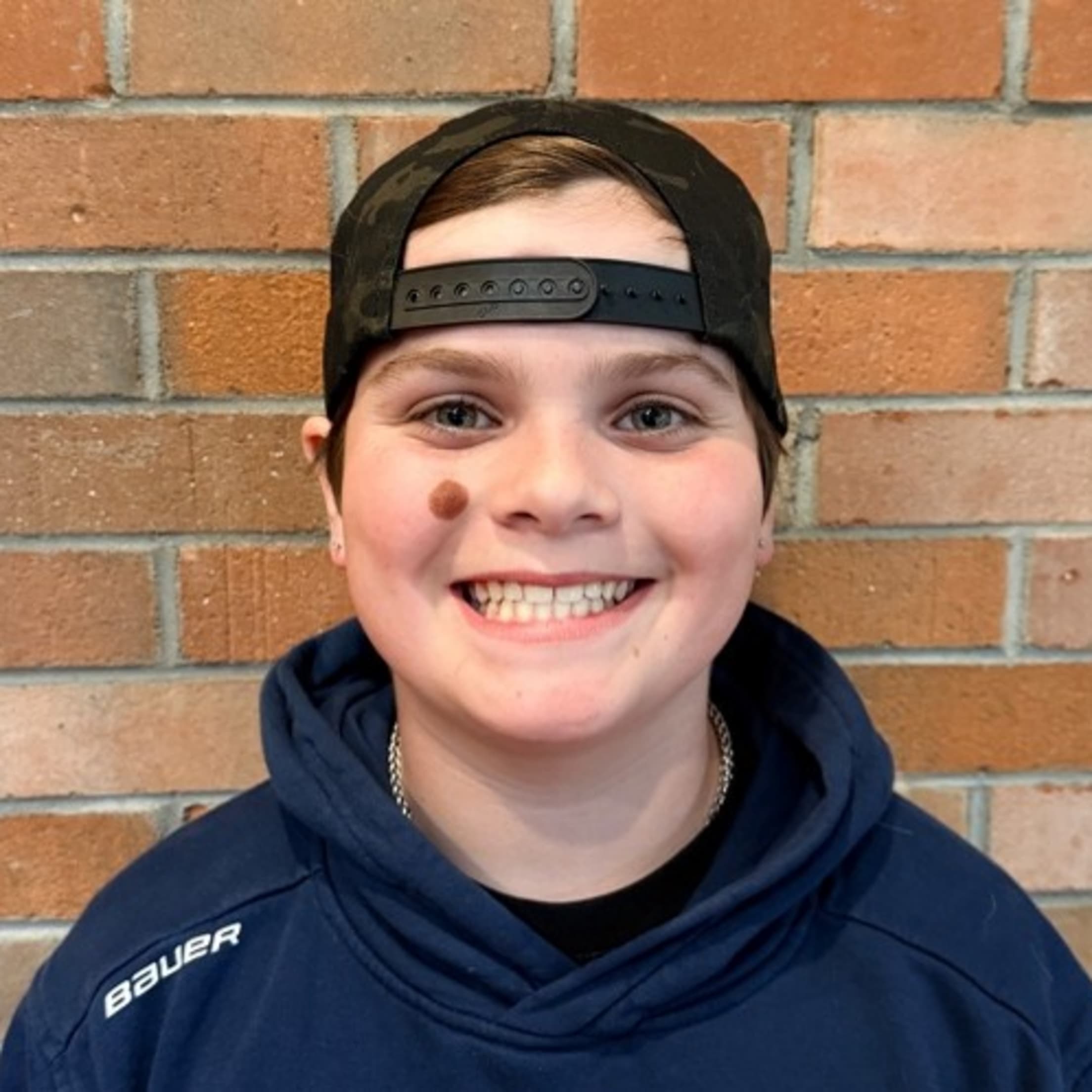 Falmouth Commodores bat kid Nason Asaro