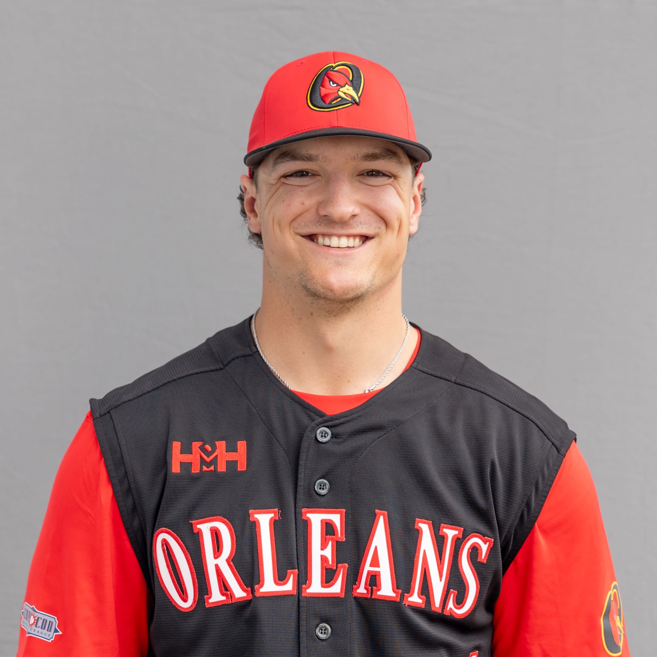 Headshot of Orleans assistant coach Will MacLean